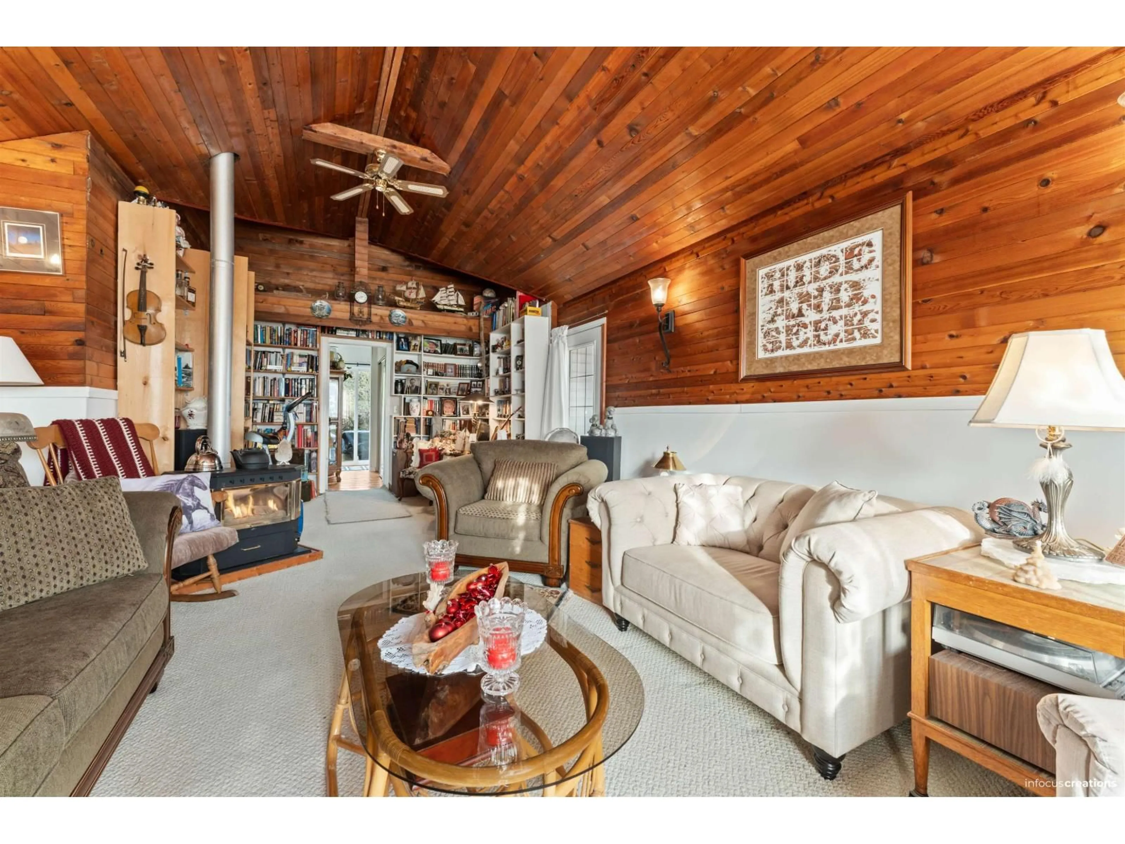 Living room with furniture, wood/laminate floor for 17307 58TH AVENUE, Surrey British Columbia V3S1K7
