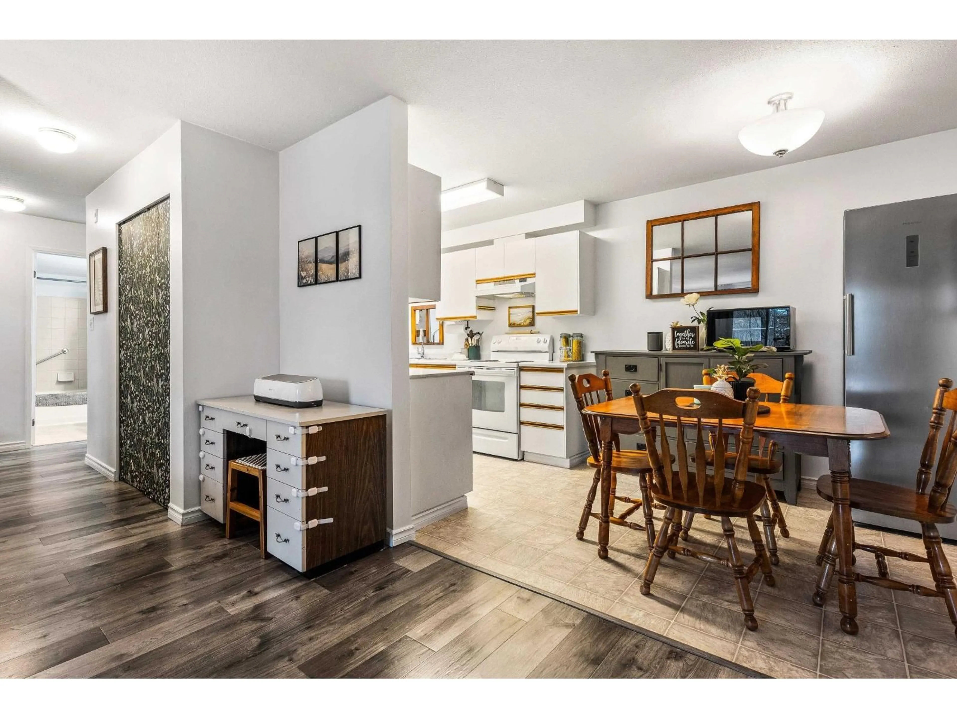 Open concept kitchen, wood/laminate floor for 316 - 7694 EVANS ROAD, Chilliwack British Columbia V2R3W3