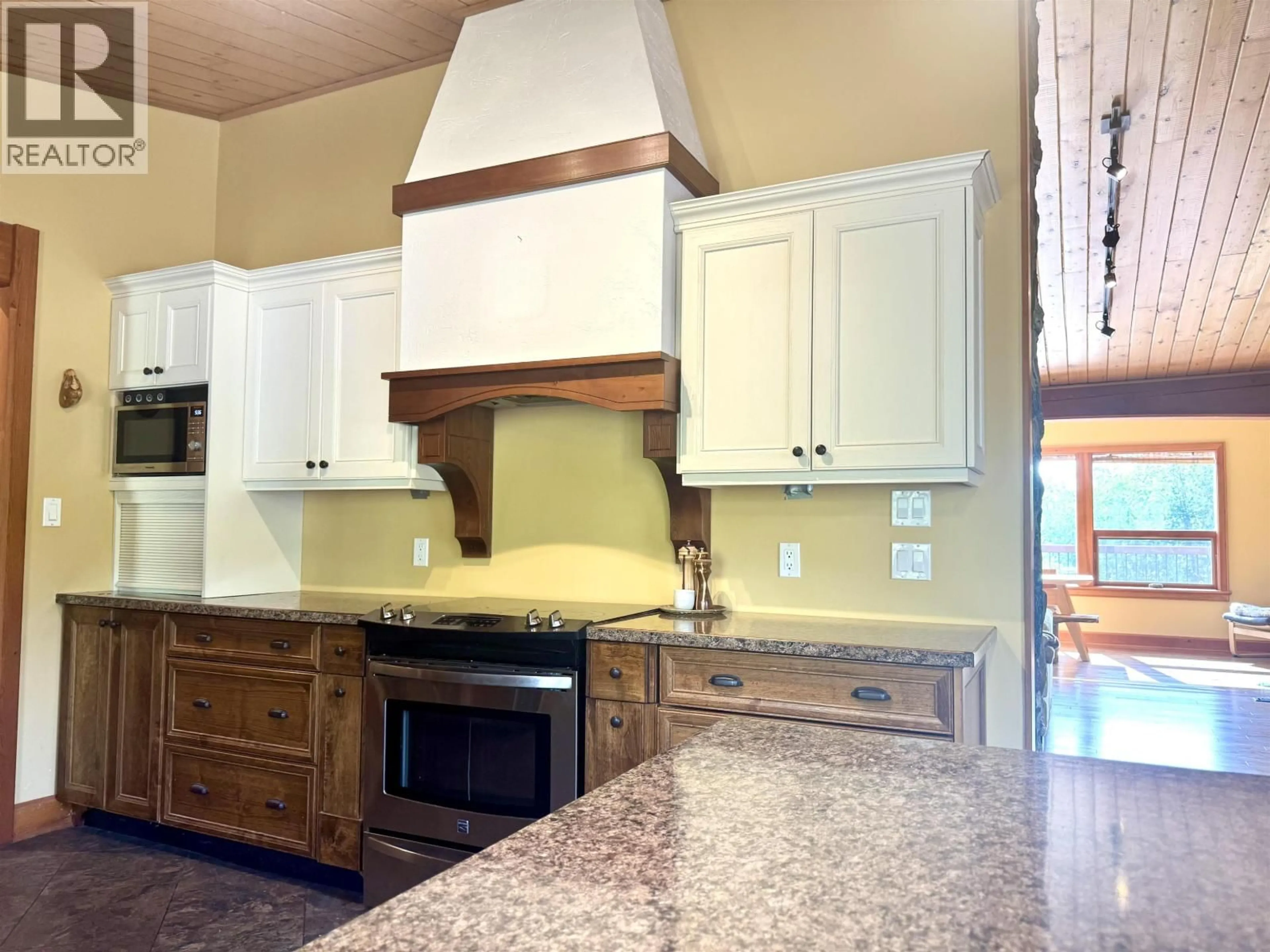 Open concept kitchen, ceramic/tile floor for 10354 HISLOP ROAD, Telkwa British Columbia V0J2X1