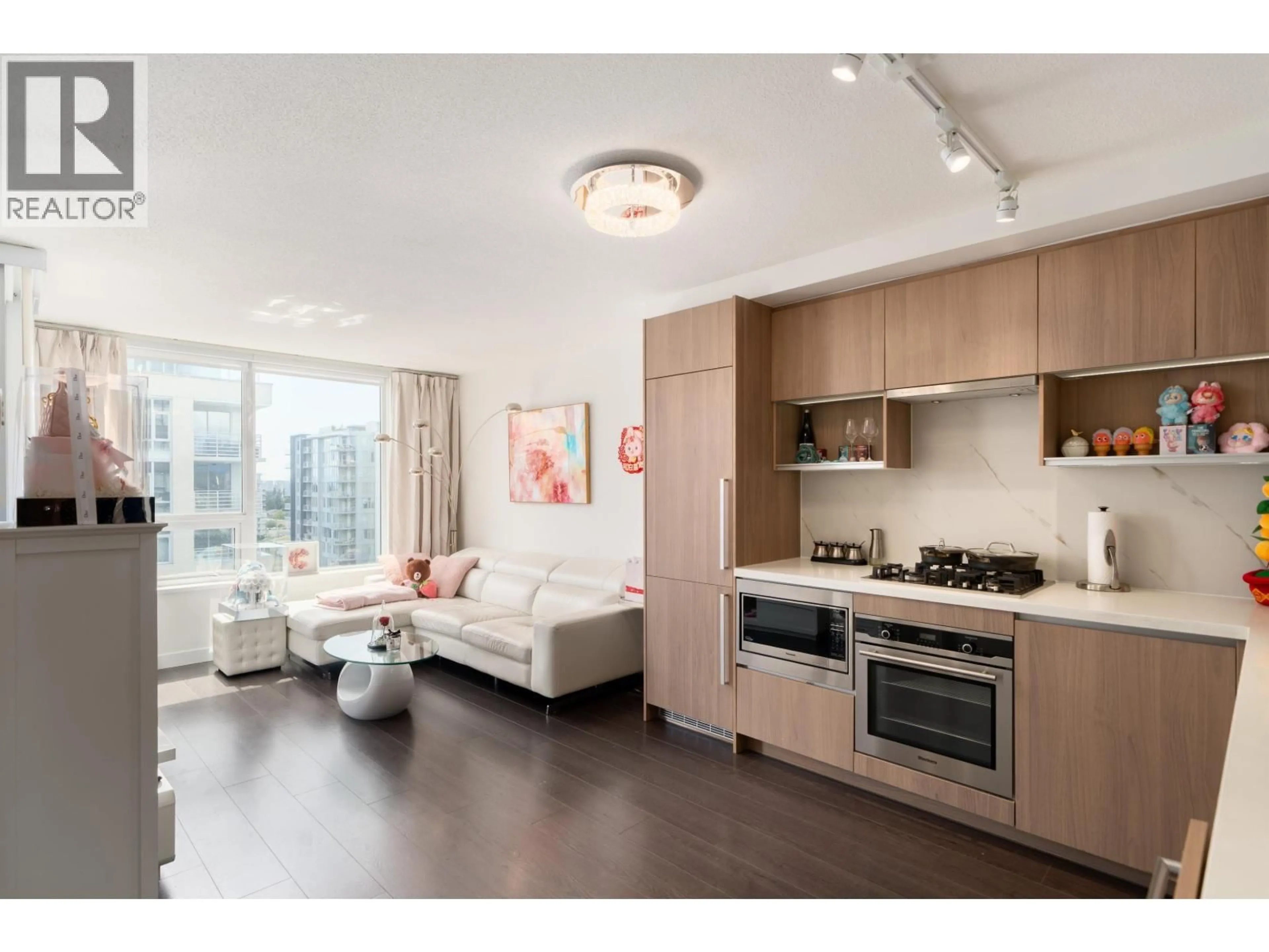 Open concept kitchen, wood/laminate floor for 1602 - 8833 HAZELBRIDGE WAY, Richmond British Columbia V6X0N3