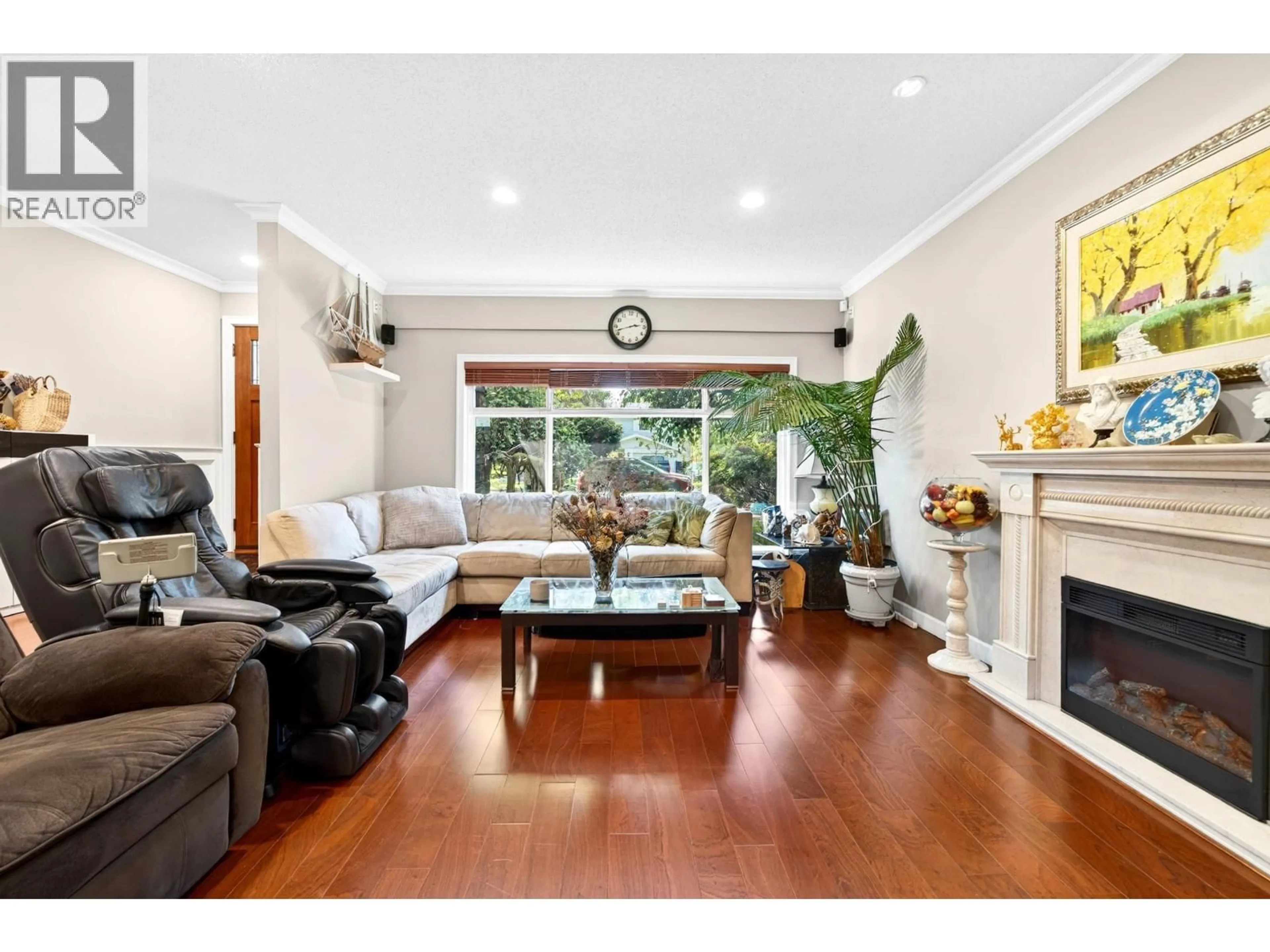 Living room with furniture, wood/laminate floor for 3152 LANCASTER PLACE, Port Coquitlam British Columbia V3C3J7
