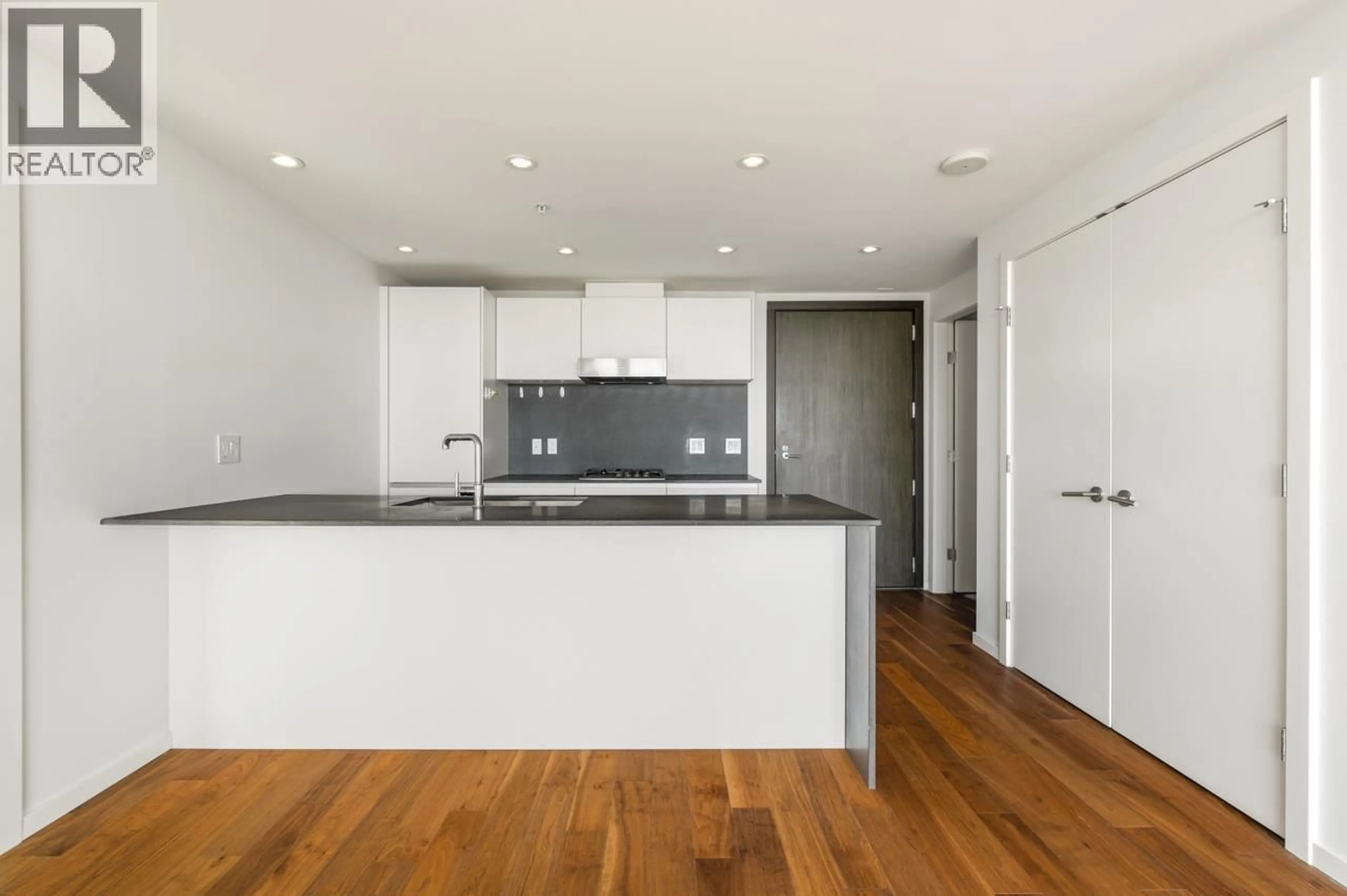 Open concept kitchen, wood/laminate floor for 1705 - 8588 CORNISH STREET, Vancouver British Columbia V6P0C1