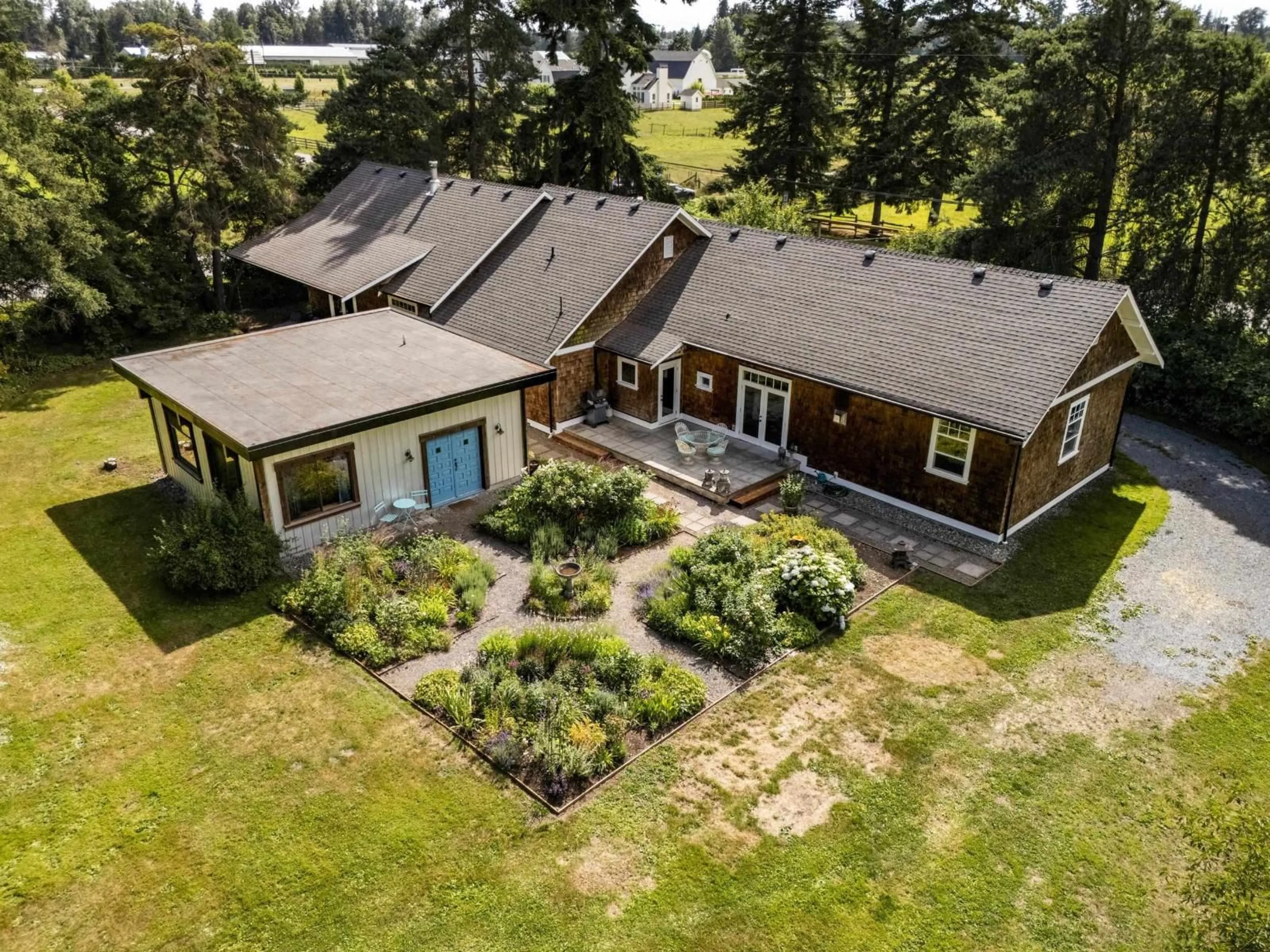 A pic from outside/outdoor area/front of a property/back of a property/a pic from drone, water/lake/river/ocean view for 816 248 STREET, Langley British Columbia V4W2G1