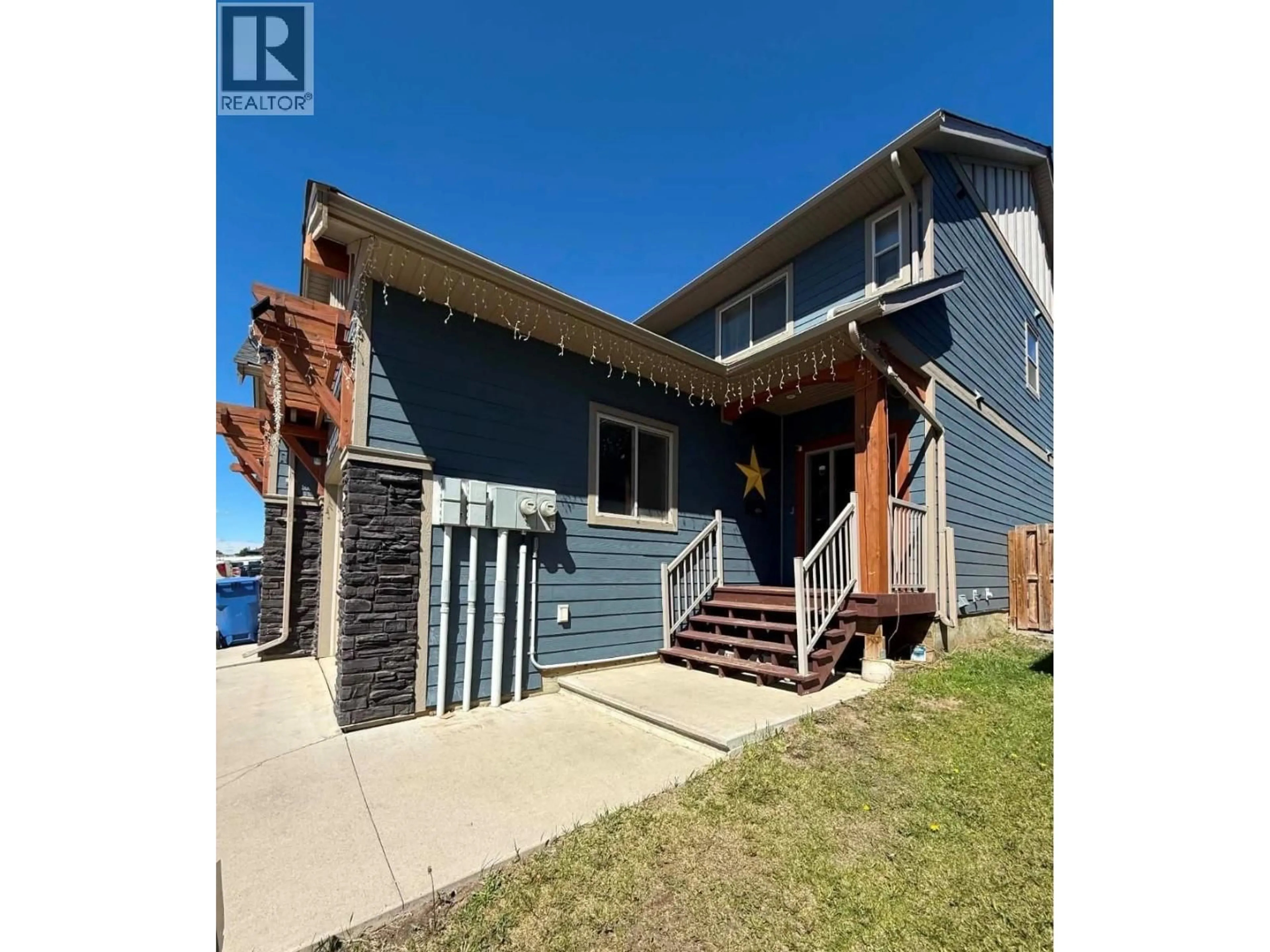 A pic from outside/outdoor area/front of a property/back of a property/a pic from drone, street for 8320 88 AVENUE, Fort St. John British Columbia V1J0N9