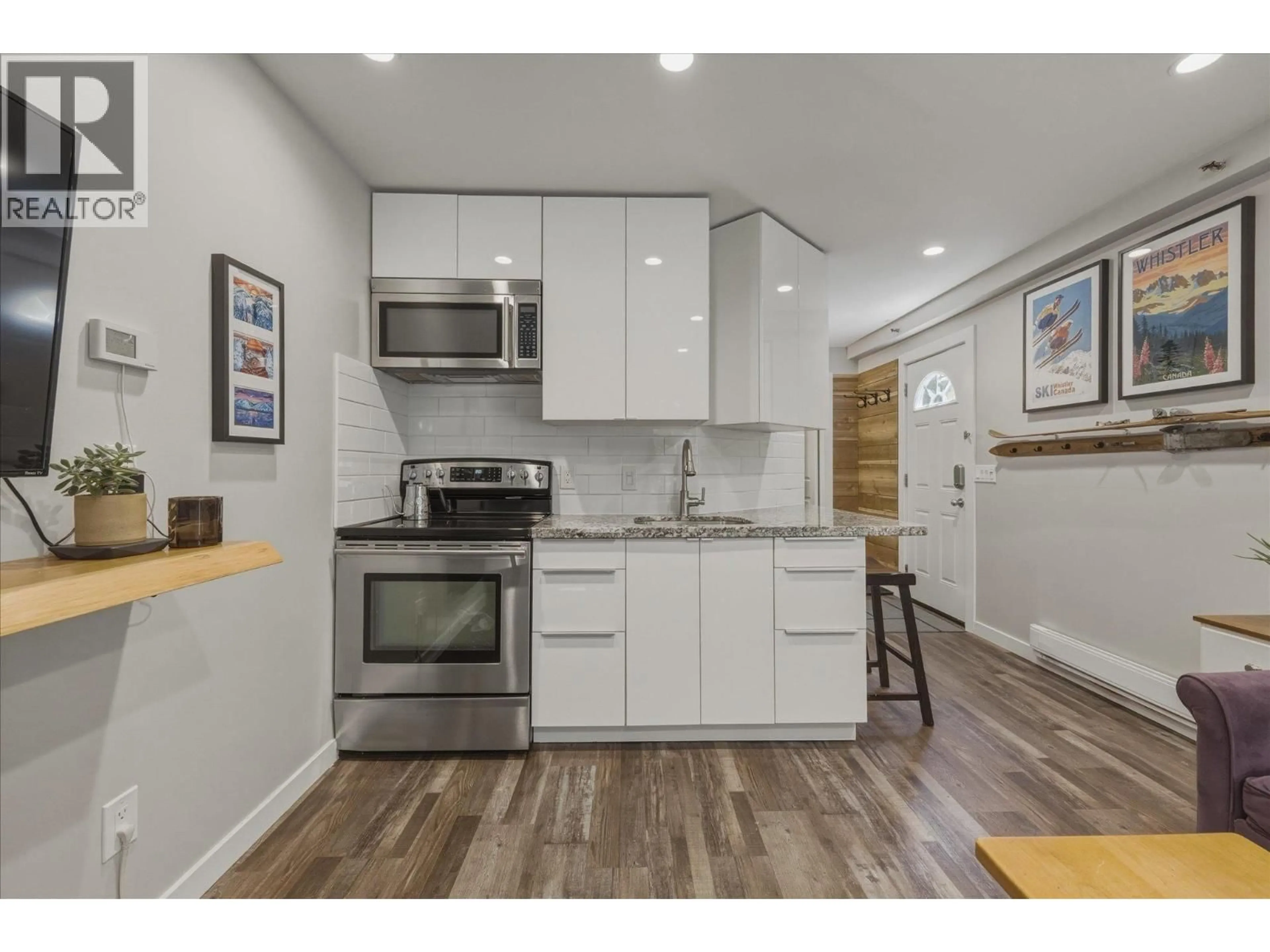 Open concept kitchen, wood/laminate floor for 3 - 2231 SAPPORO DRIVE, Whistler British Columbia V8E0B5