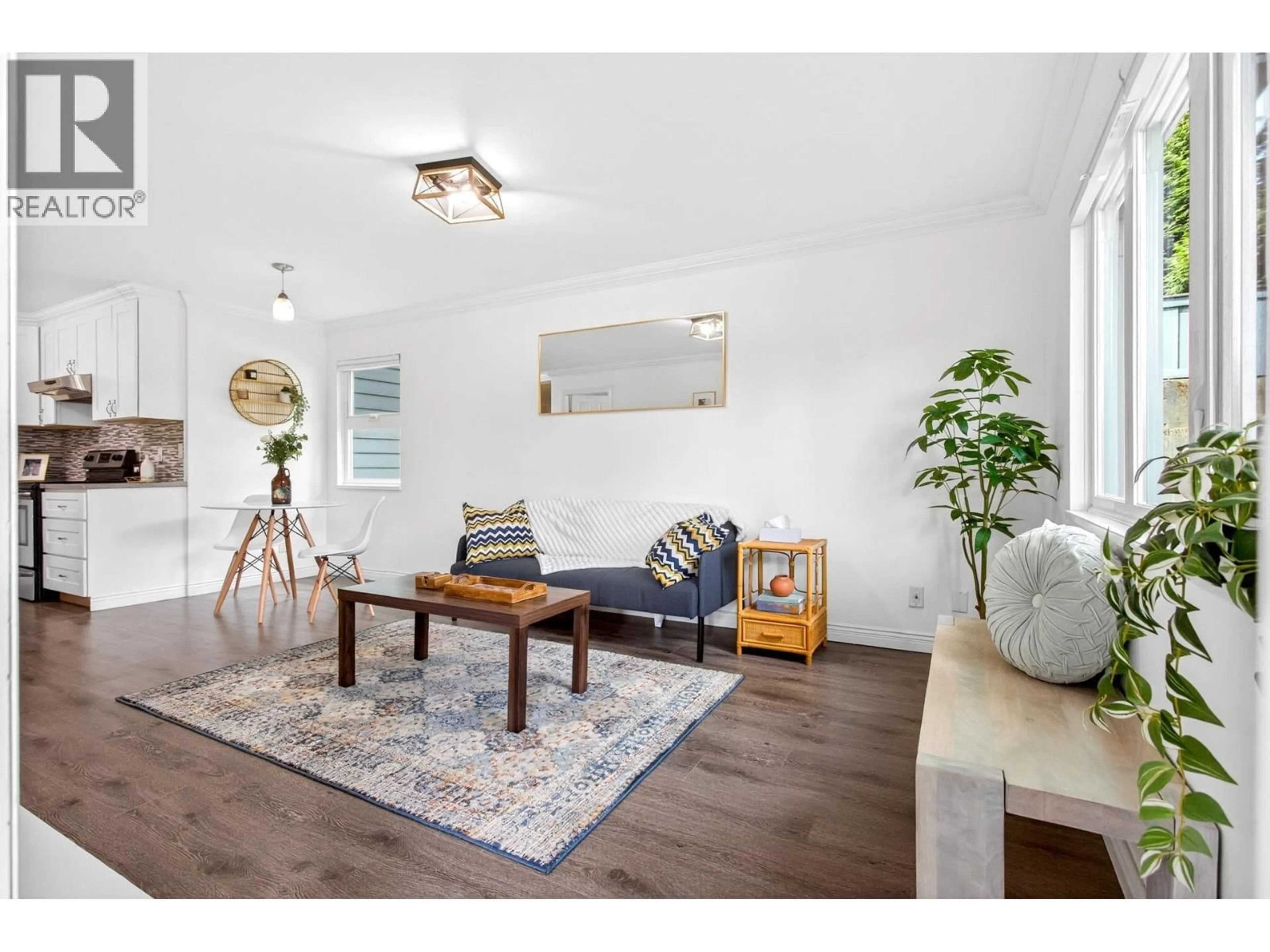 Living room with furniture, wood/laminate floor for 105 - 1122 KING ALBERT AVENUE, Coquitlam British Columbia V3J1X7