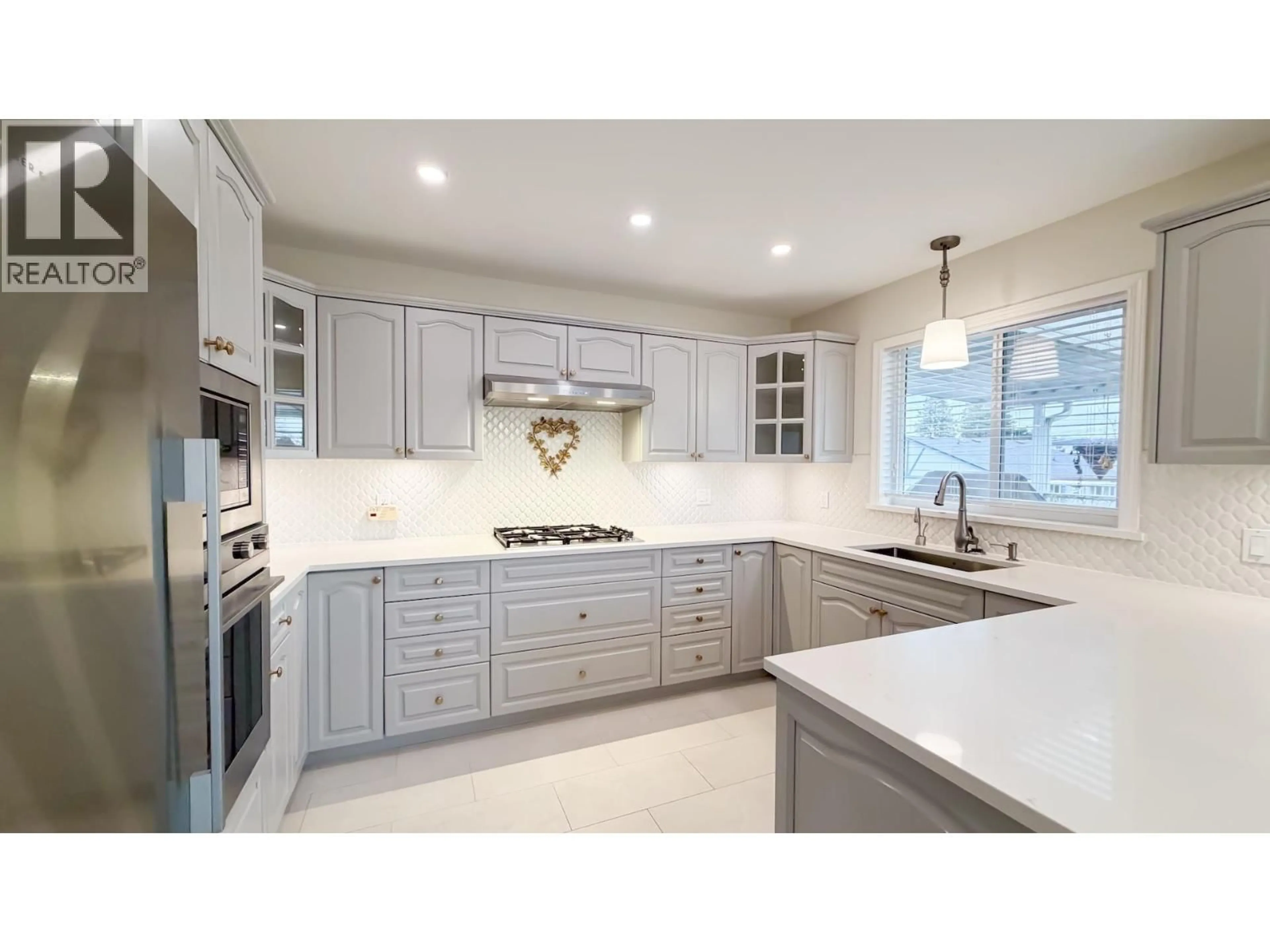 Contemporary kitchen, ceramic/tile floor for 6462 NANAIMO STREET, Vancouver British Columbia V5P4K8