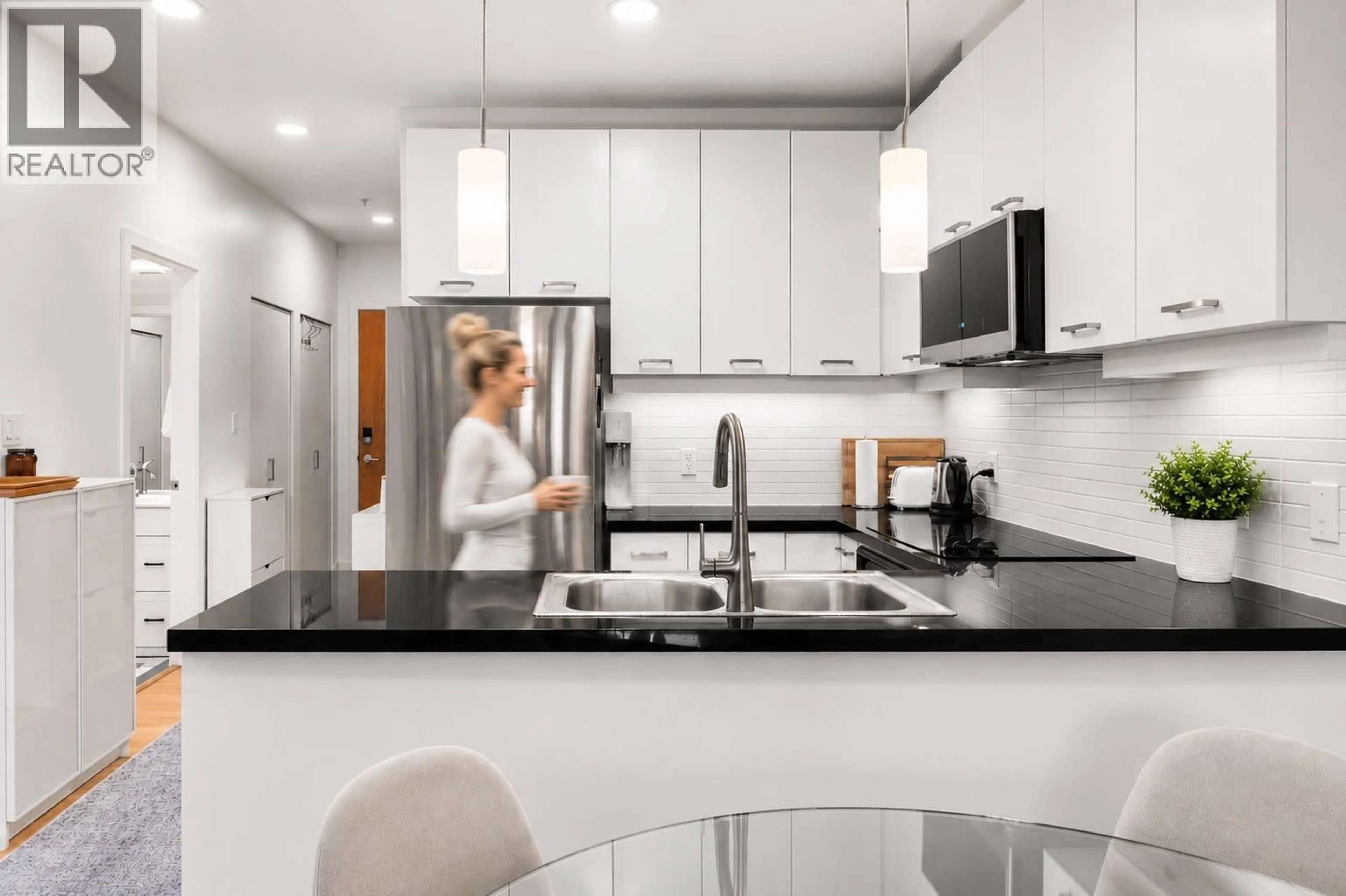 Open concept kitchen, unknown for 317 - 530 RAVEN WOODS DRIVE, North Vancouver British Columbia V7G2T5