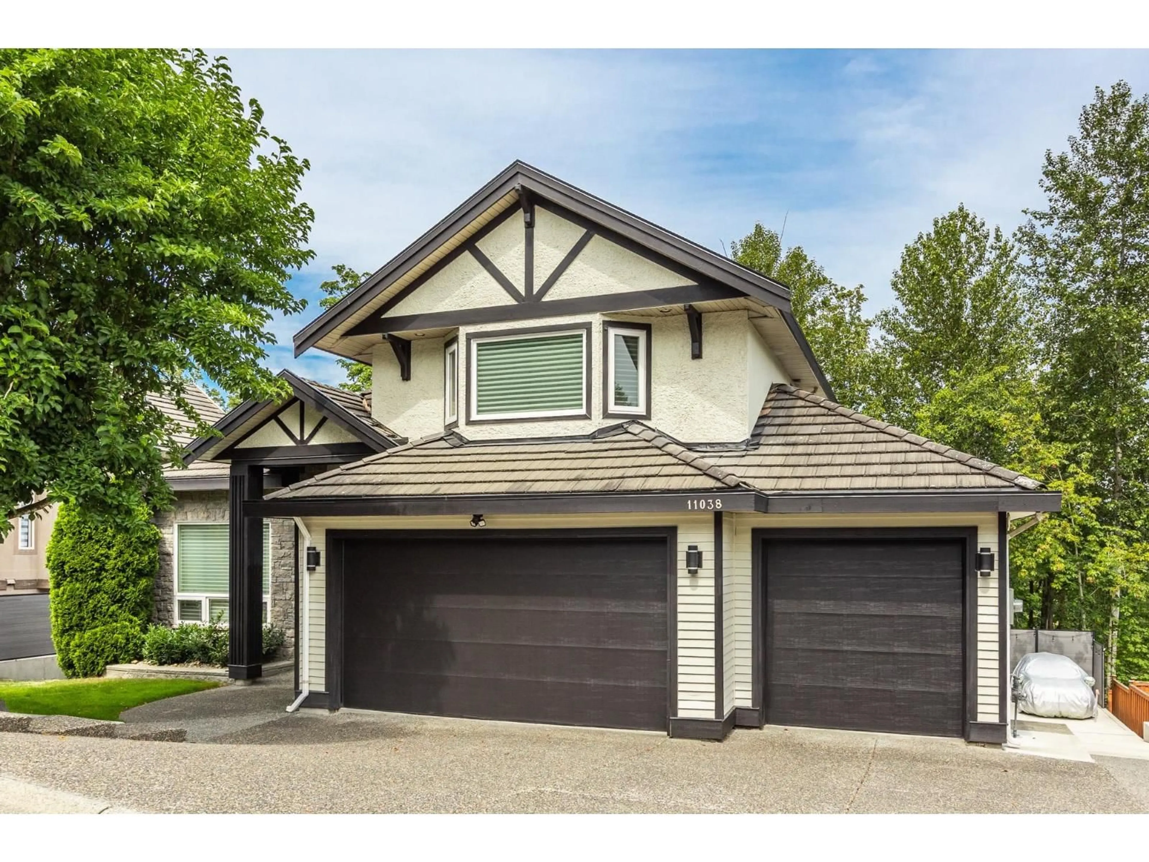Home with vinyl exterior material, street for 11038 168 STREET, Surrey British Columbia V4N5G5
