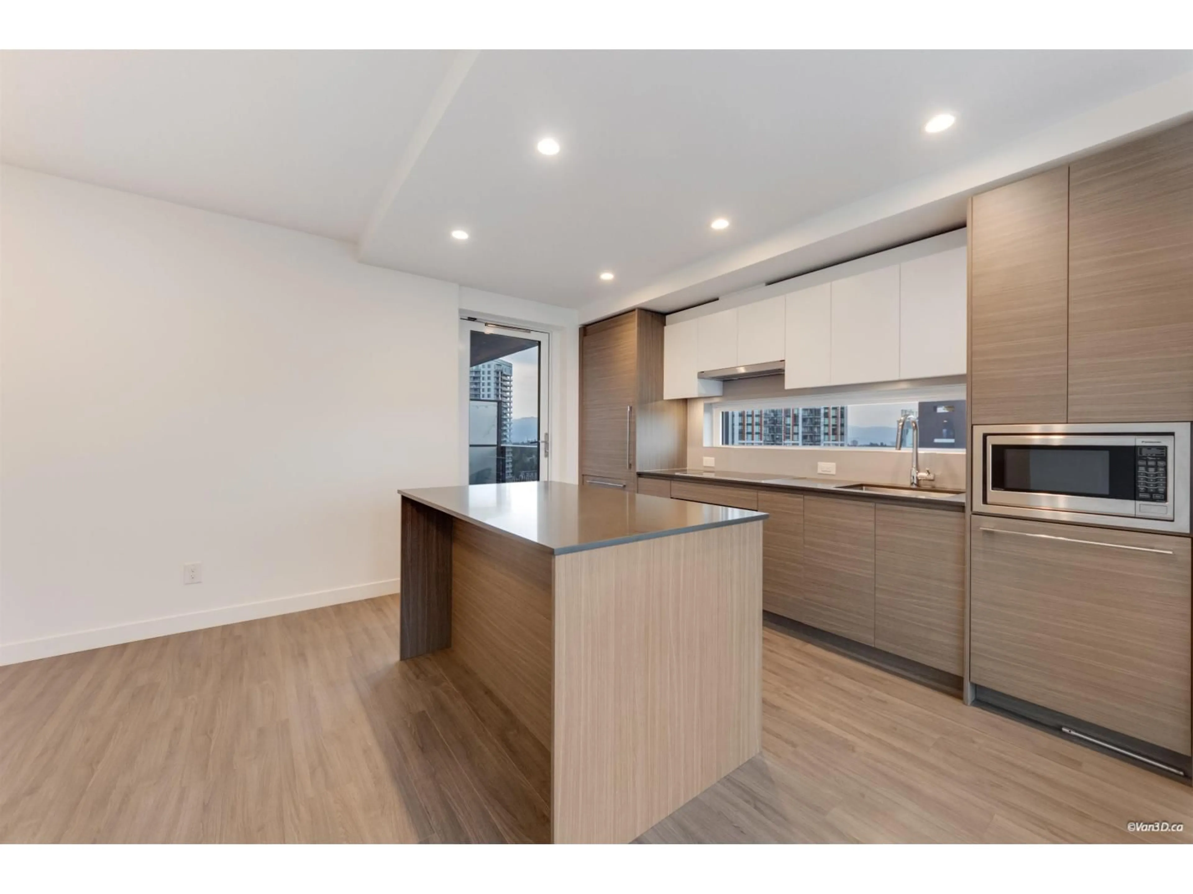 Open concept kitchen, wood/laminate floor for 2910 - 13615 FRASER HIGHWAY, Surrey British Columbia V3T0P7