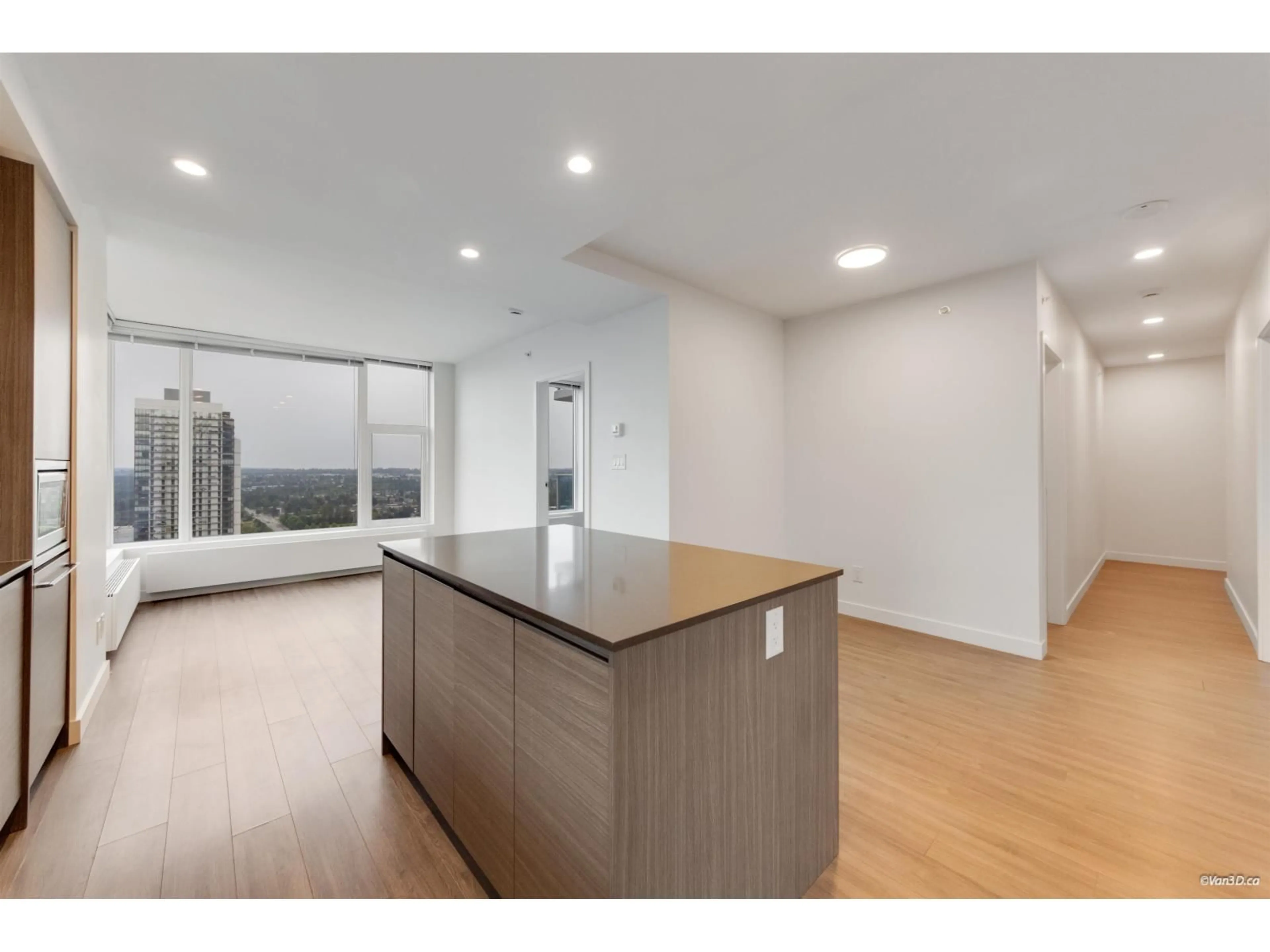 Open concept kitchen, wood/laminate floor for 2910 - 13615 FRASER HIGHWAY, Surrey British Columbia V3T0P7