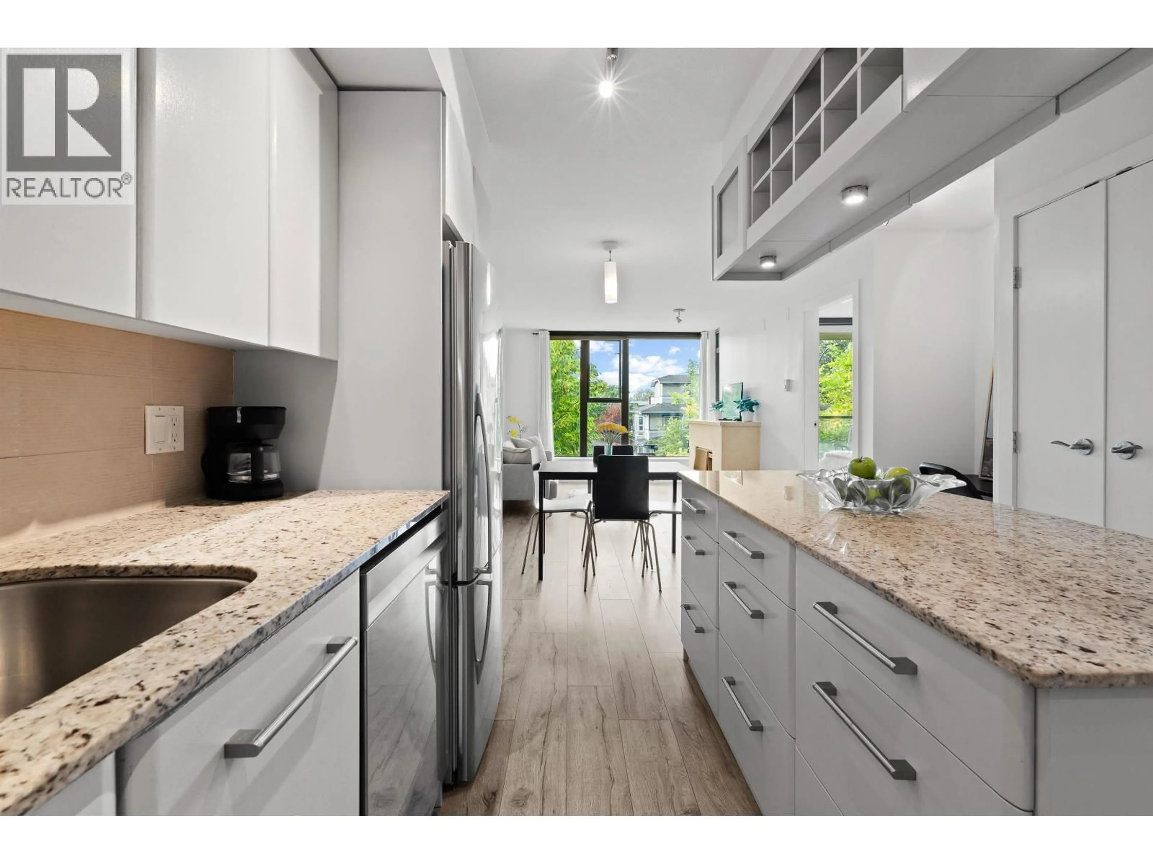 Open concept kitchen, ceramic/tile floor for 306 - 683 VICTORIA PARK, North Vancouver British Columbia V7M0A2