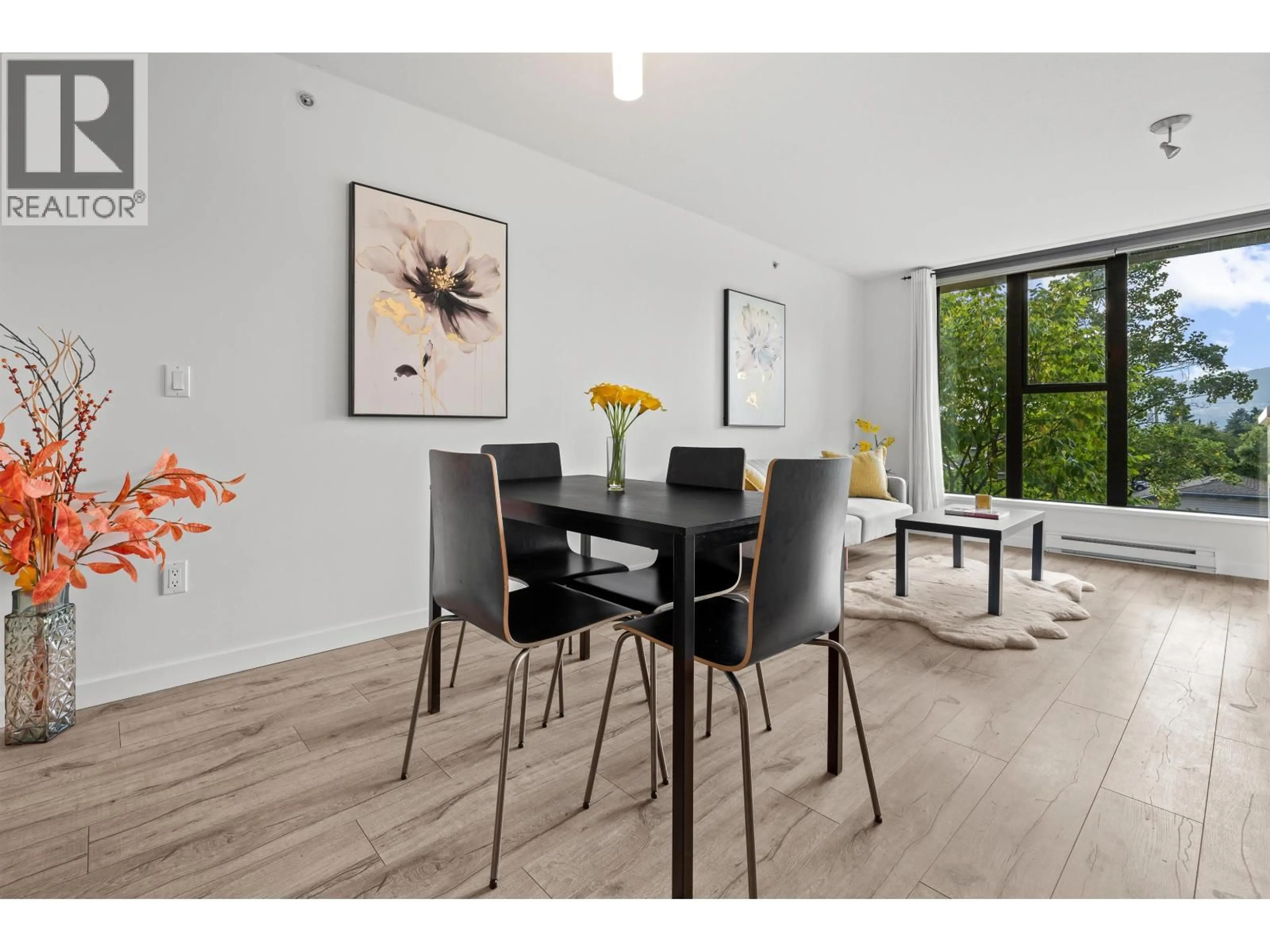 Dining room, wood/laminate floor for 306 - 683 VICTORIA PARK, North Vancouver British Columbia V7M0A2