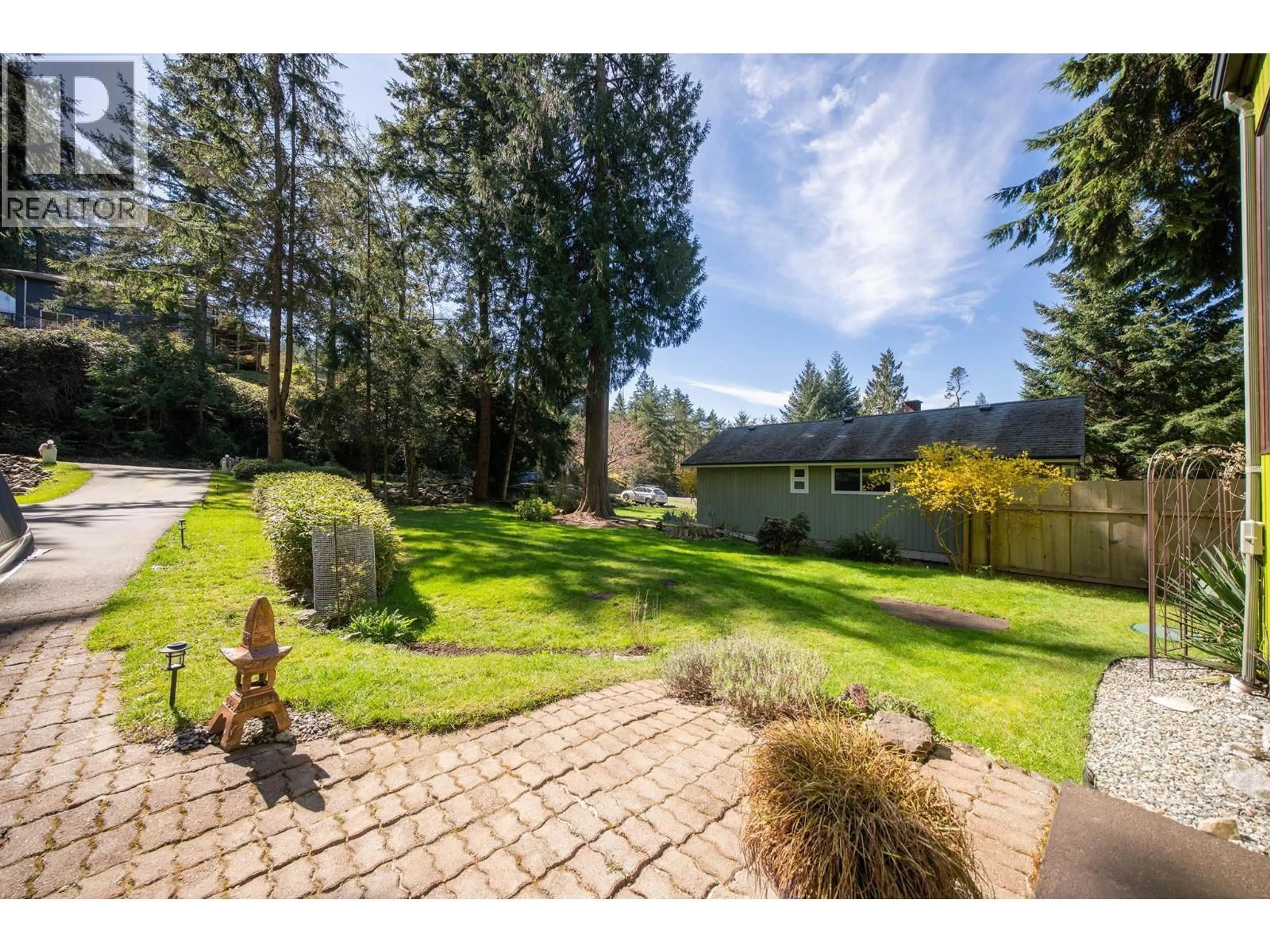 A pic from outside/outdoor area/front of a property/back of a property/a pic from drone, unknown for 1540 TUNSTALL BOULEVARD, Bowen Island British Columbia V0N1G2