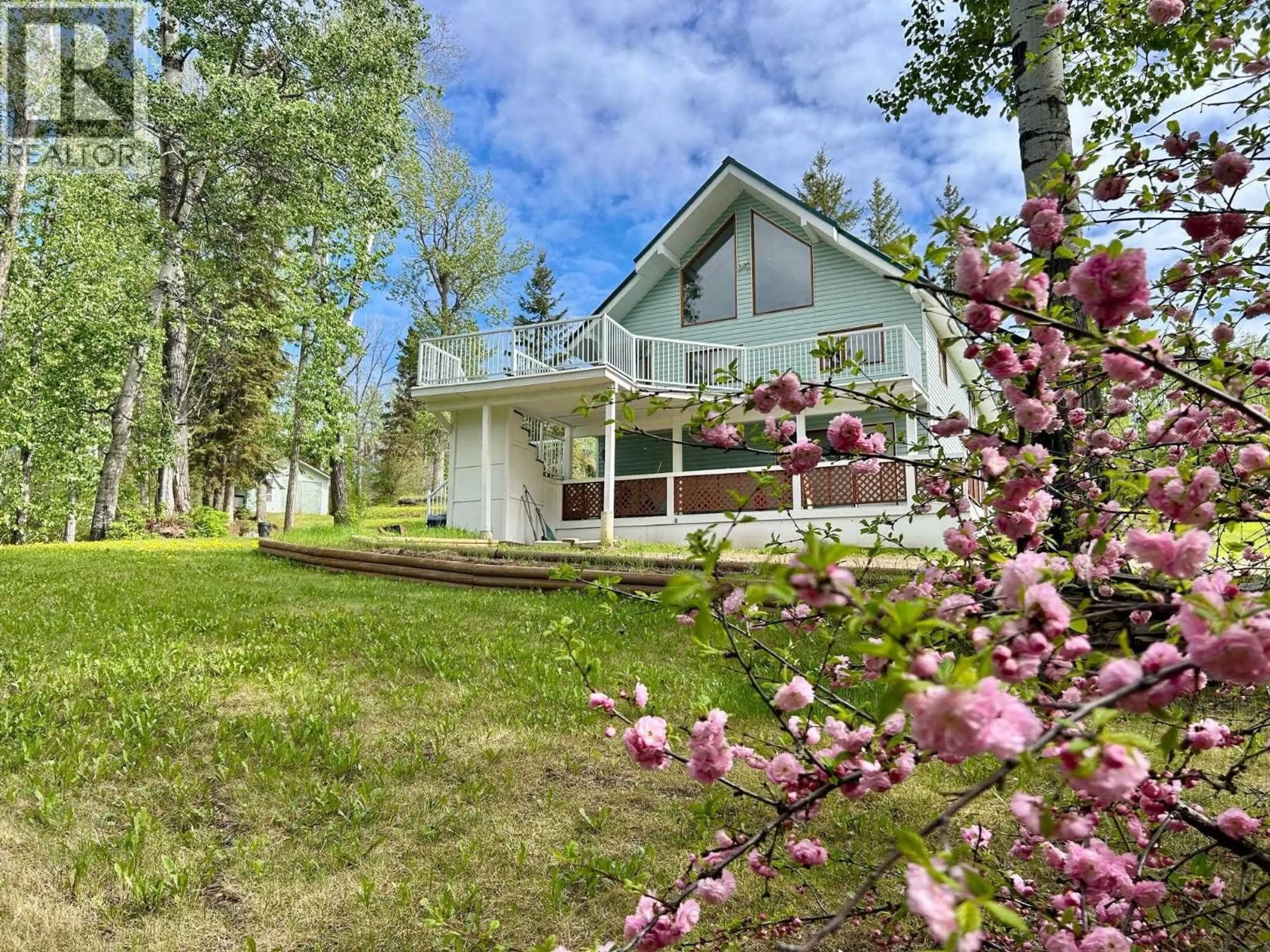 A pic from outside/outdoor area/front of a property/back of a property/a pic from drone, mountain view for 7524 VALLEYVIEW DRIVE, Fort Nelson British Columbia V0C1R0