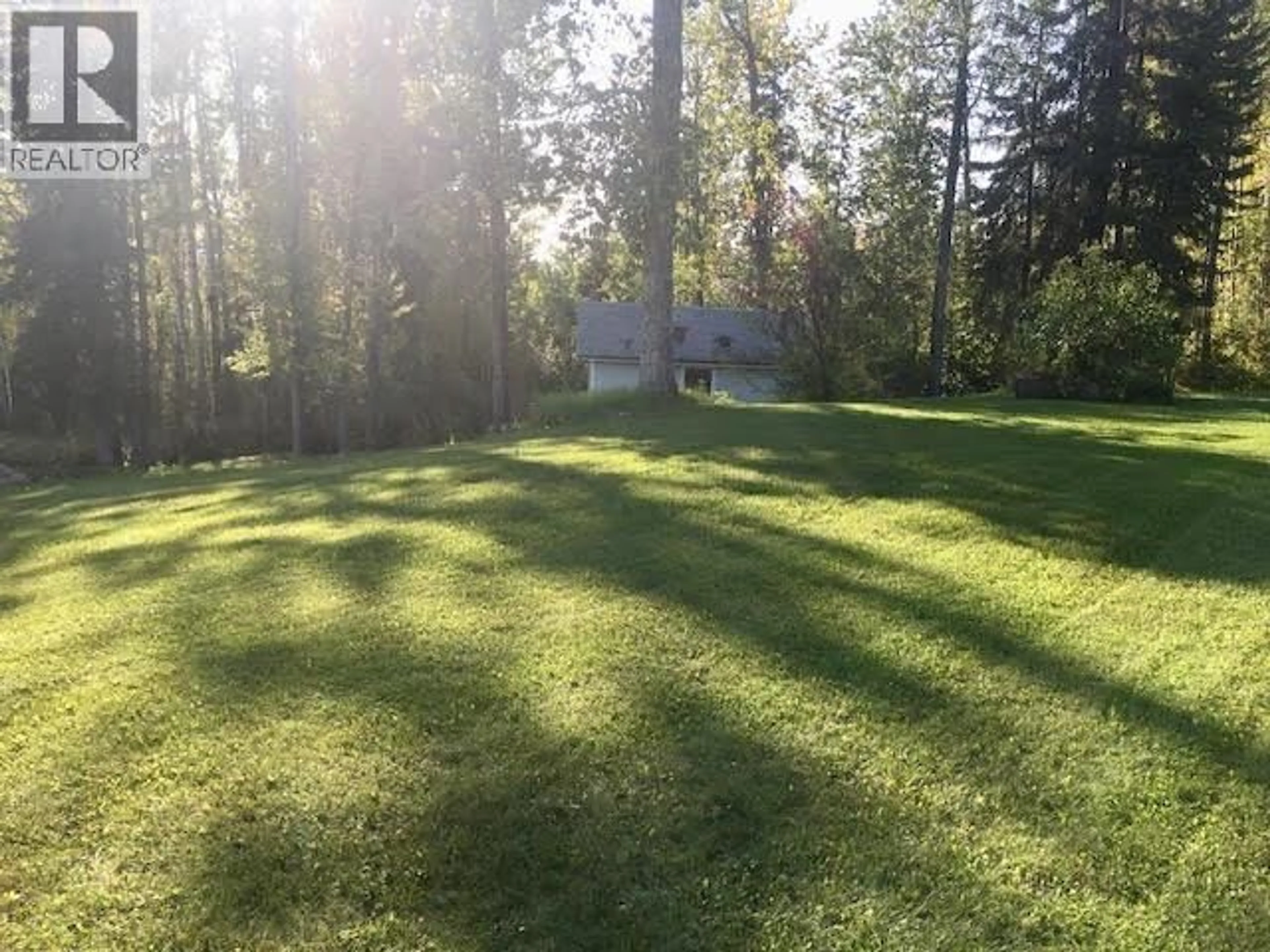 A pic from outside/outdoor area/front of a property/back of a property/a pic from drone, forest/trees view for 7524 VALLEYVIEW DRIVE, Fort Nelson British Columbia V0C1R0