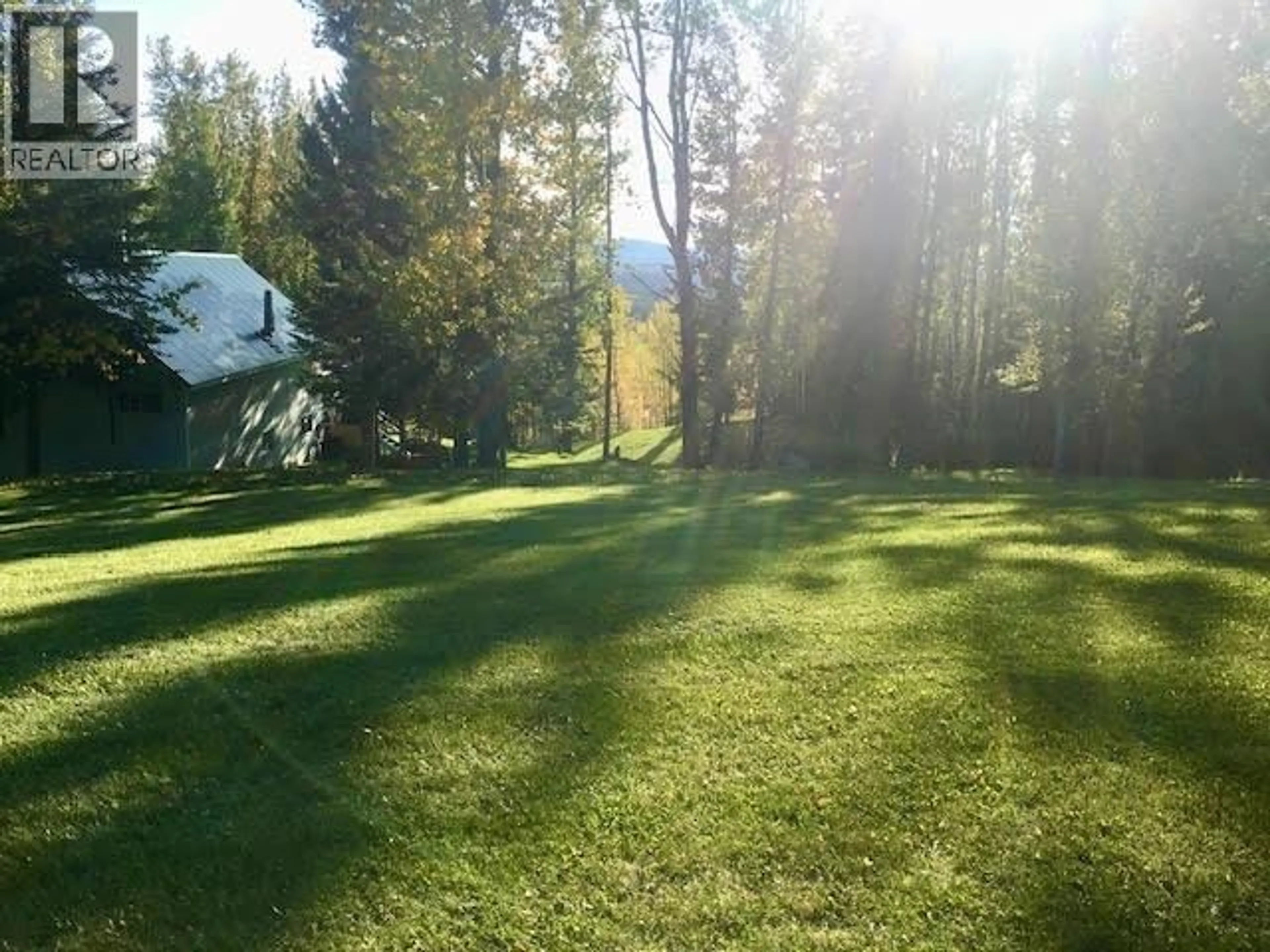A pic from outside/outdoor area/front of a property/back of a property/a pic from drone, forest/trees view for 7524 VALLEYVIEW DRIVE, Fort Nelson British Columbia V0C1R0
