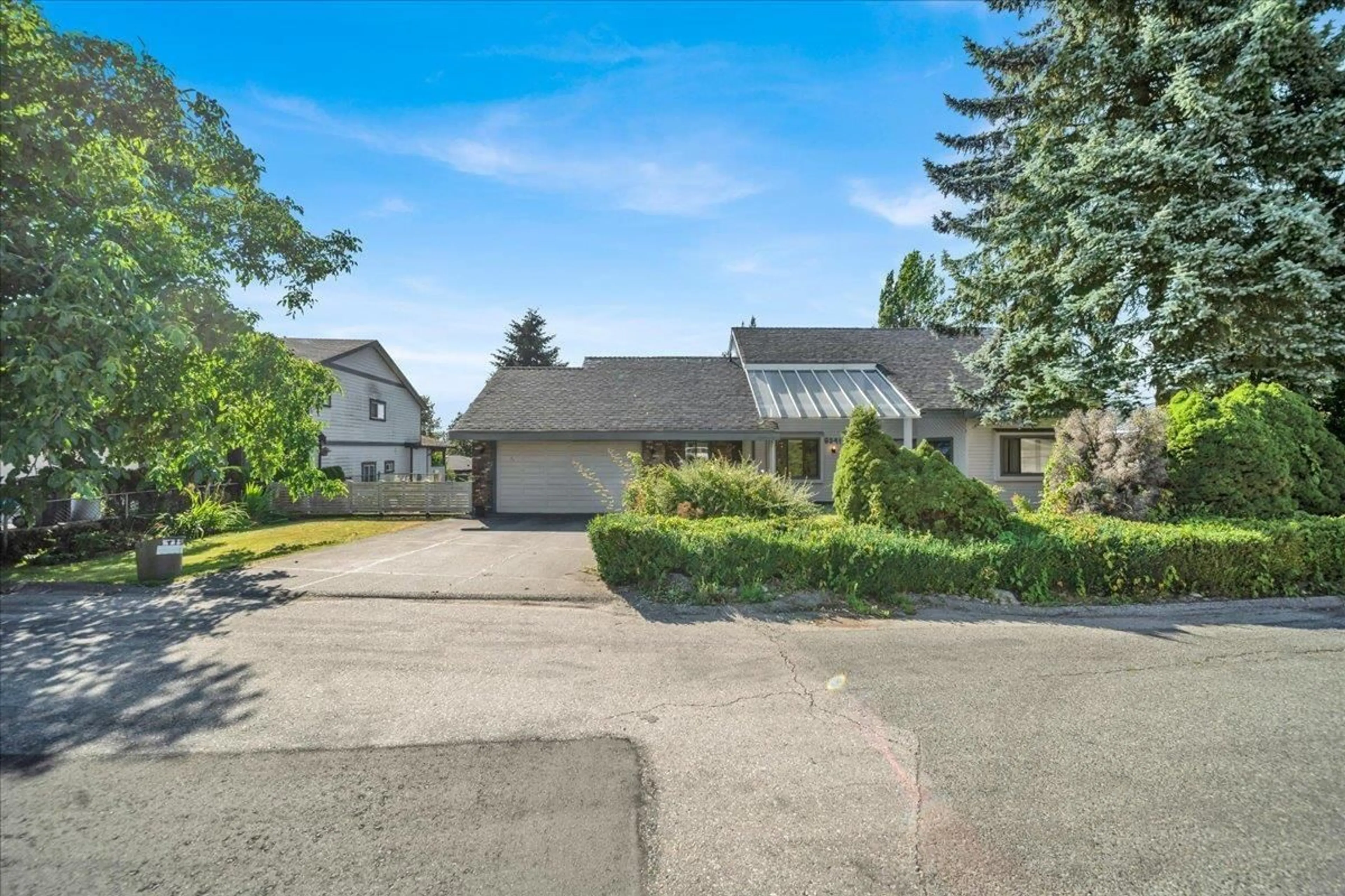 A pic from outside/outdoor area/front of a property/back of a property/a pic from drone, street for 9341 EBOR ROAD, Delta British Columbia V4C4R4