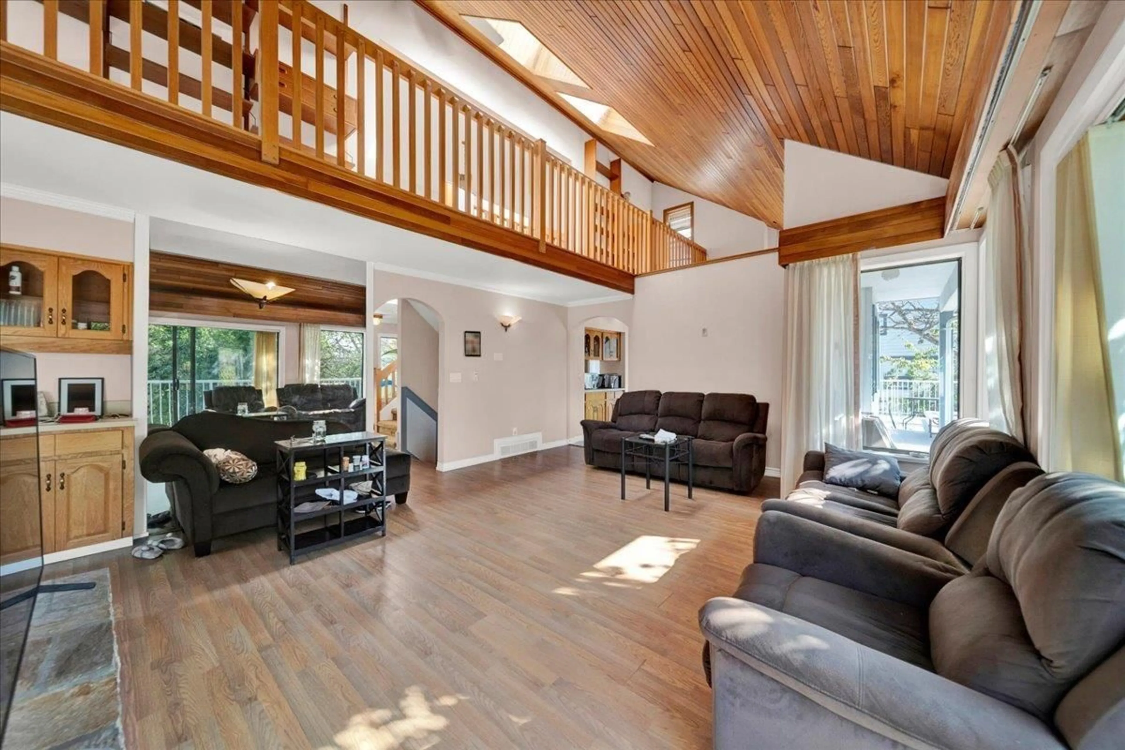 Living room with furniture, wood/laminate floor for 9341 EBOR ROAD, Delta British Columbia V4C4R4