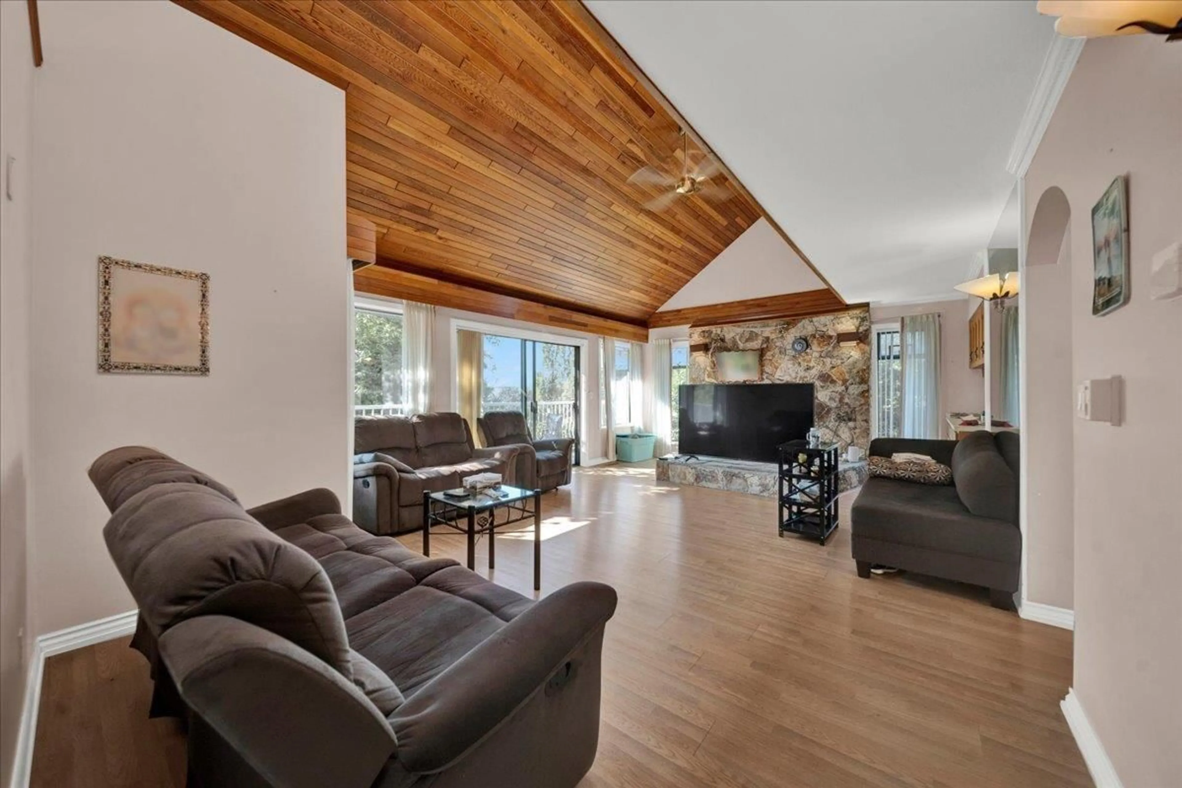 Living room with furniture, wood/laminate floor for 9341 EBOR ROAD, Delta British Columbia V4C4R4