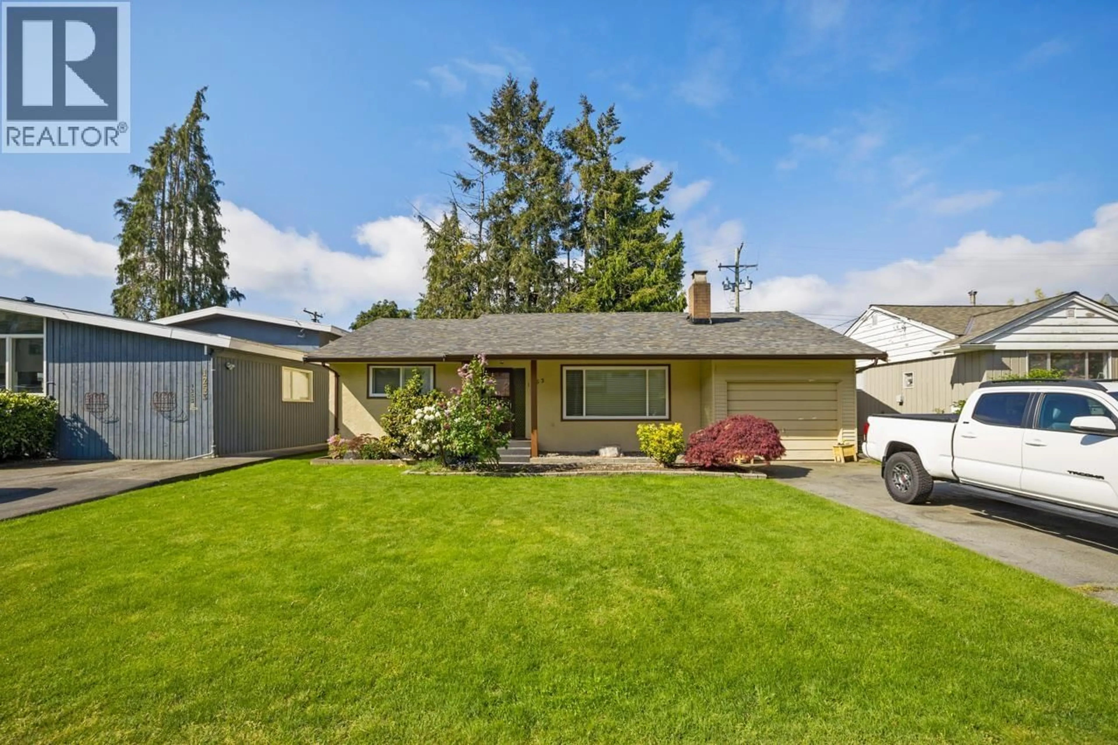 Home with vinyl exterior material, street for 1263 HUNTER ROAD, Delta British Columbia V4L1Y9