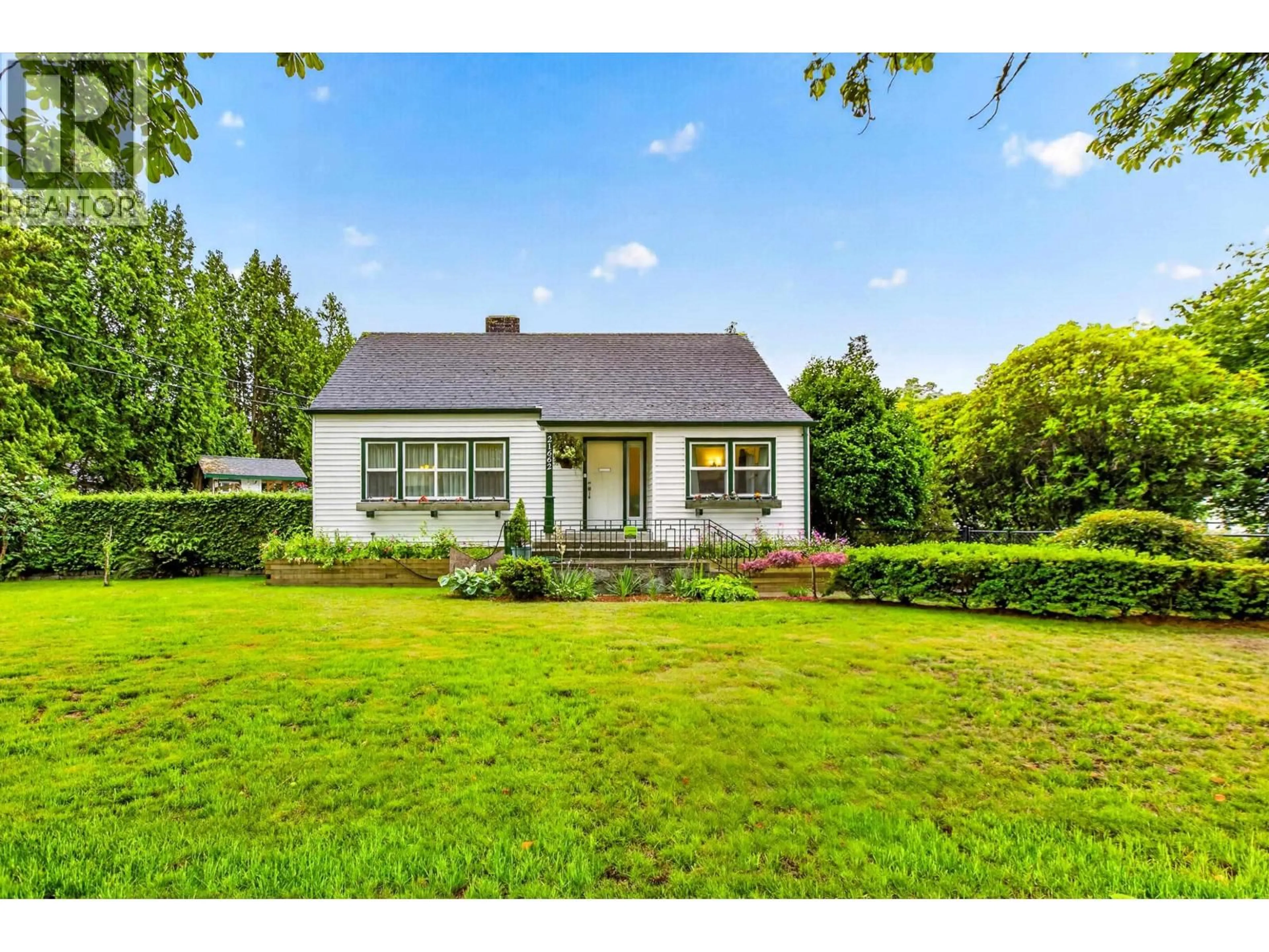 A pic from outside/outdoor area/front of a property/back of a property/a pic from drone, street for 21662 RIVER ROAD, Maple Ridge British Columbia V2X2B7