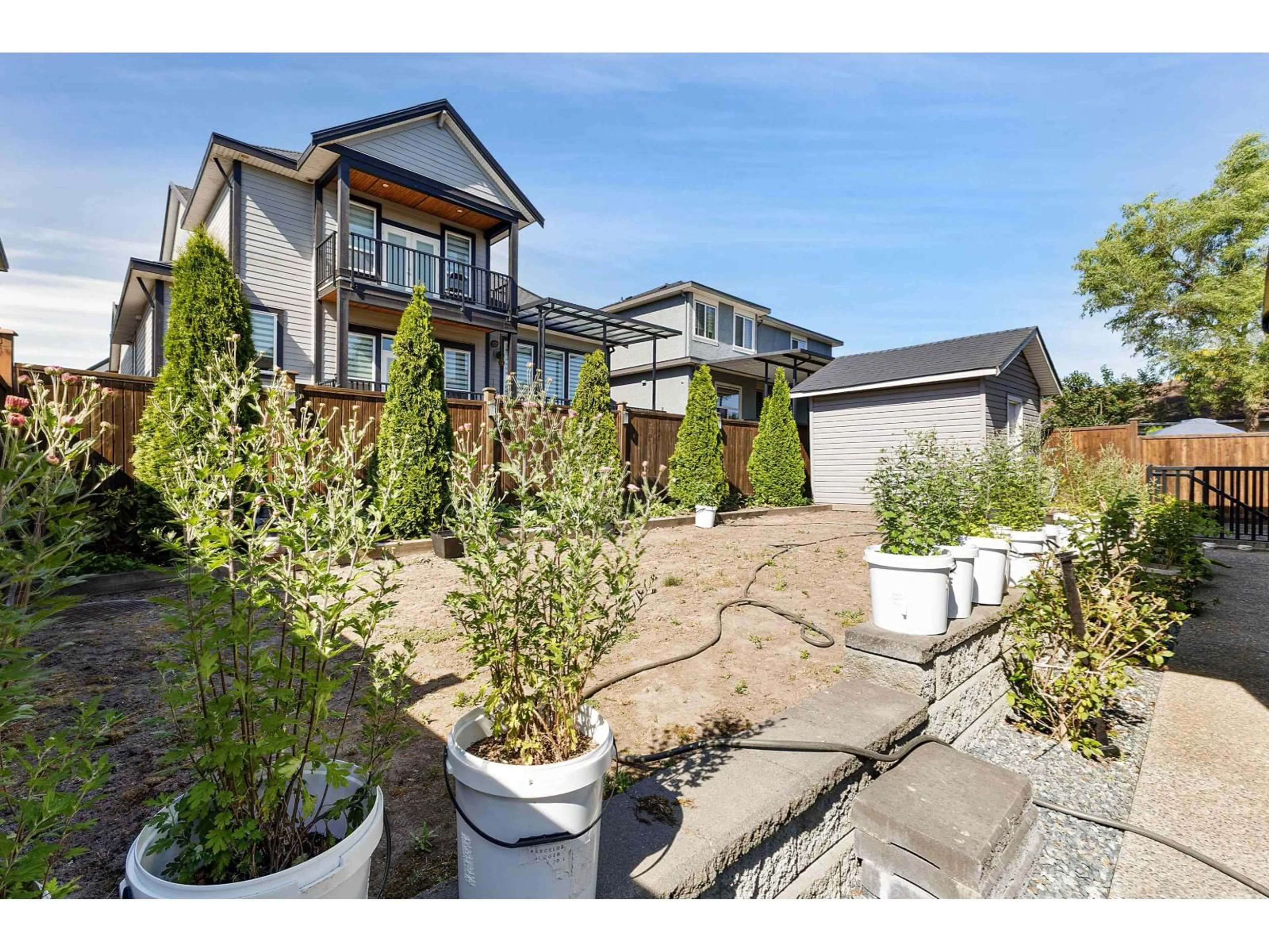 A pic from outside/outdoor area/front of a property/back of a property/a pic from drone, unknown for 18585 56 AVENUE, Surrey British Columbia V3S9E5