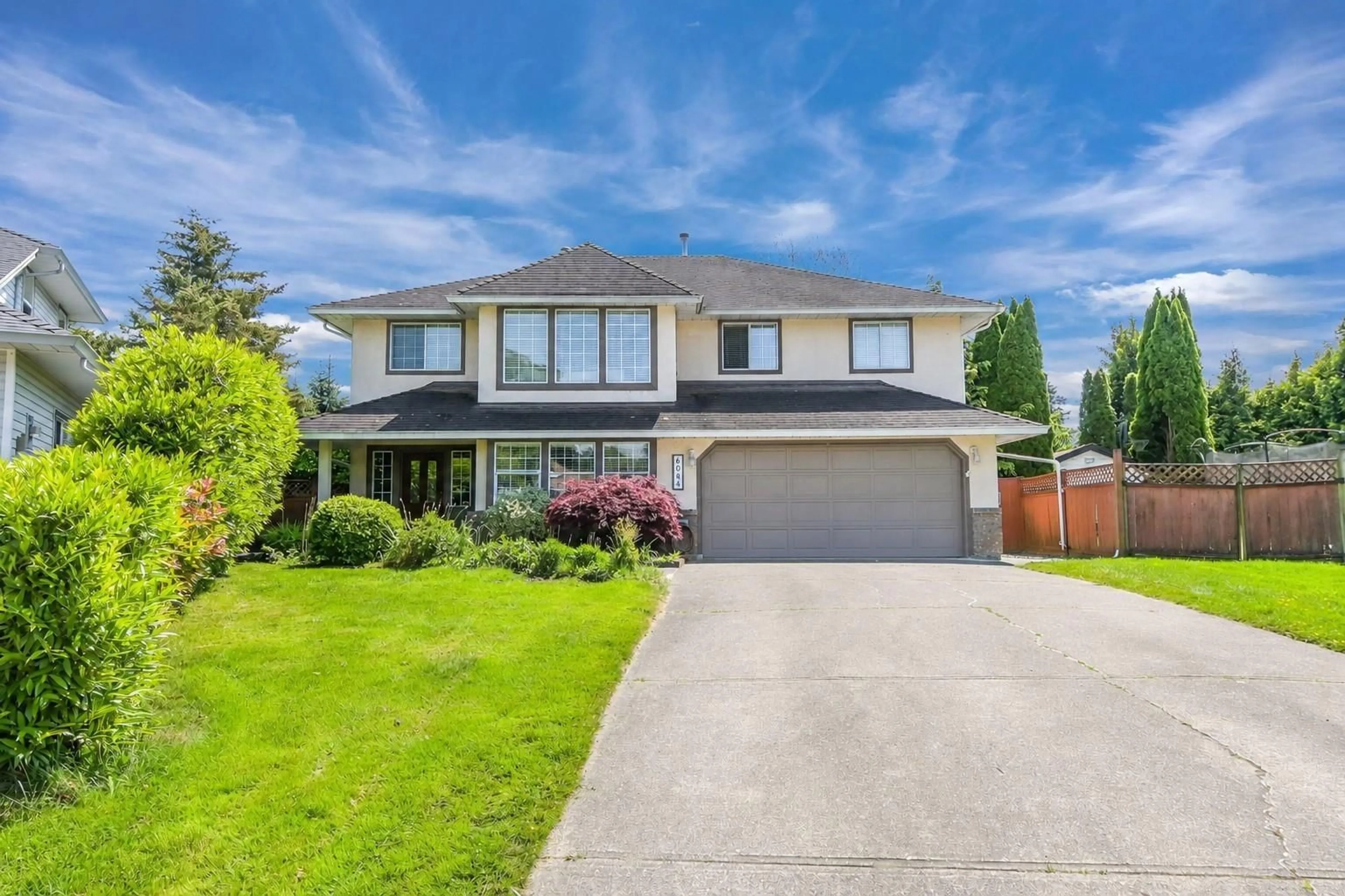 Home with vinyl exterior material, street for 6084 185 STREET, Surrey British Columbia V3S7P7