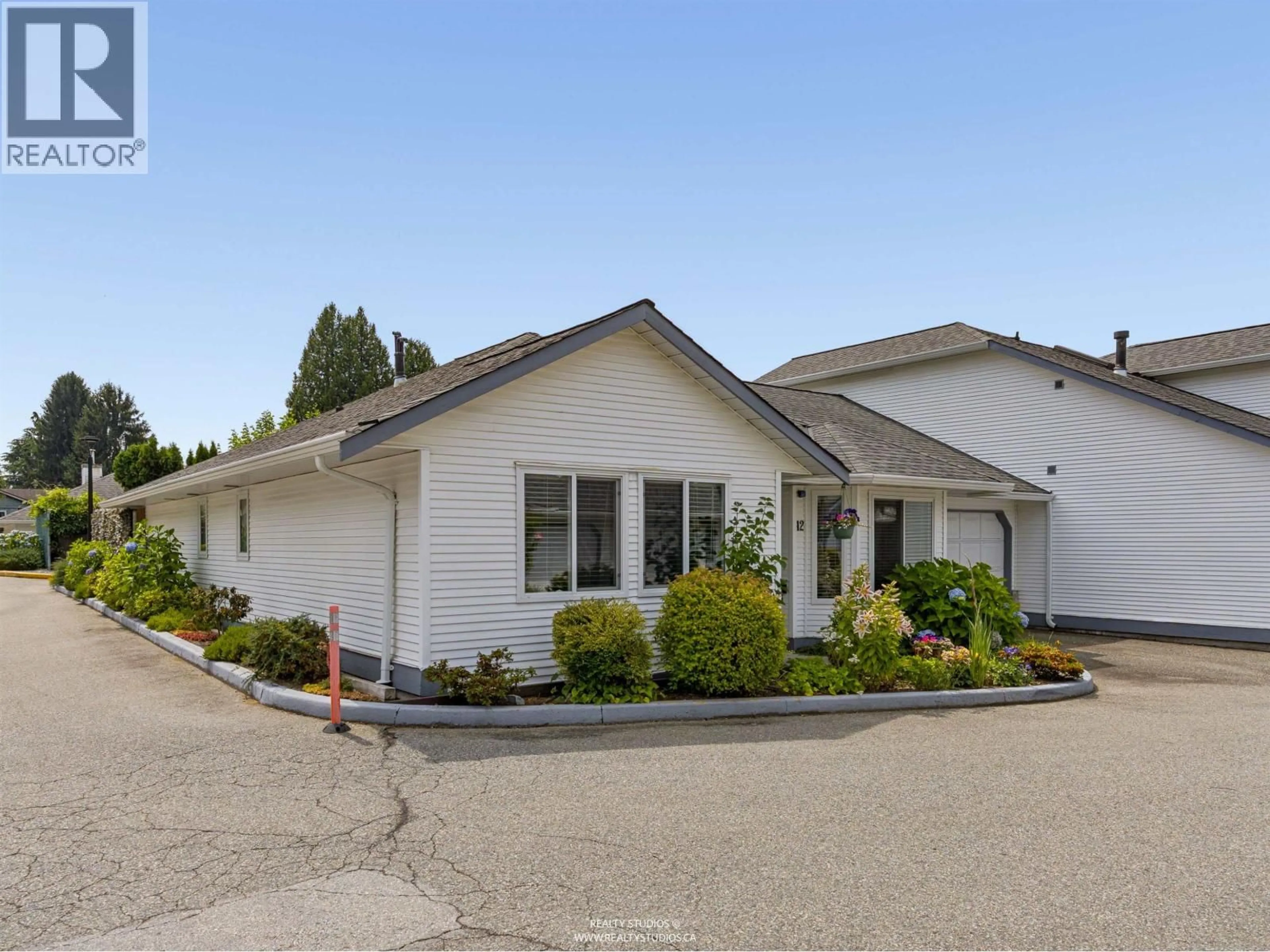 Home with vinyl exterior material, street for 12 - 19171 MITCHELL ROAD, Pitt Meadows British Columbia V3Y2G3