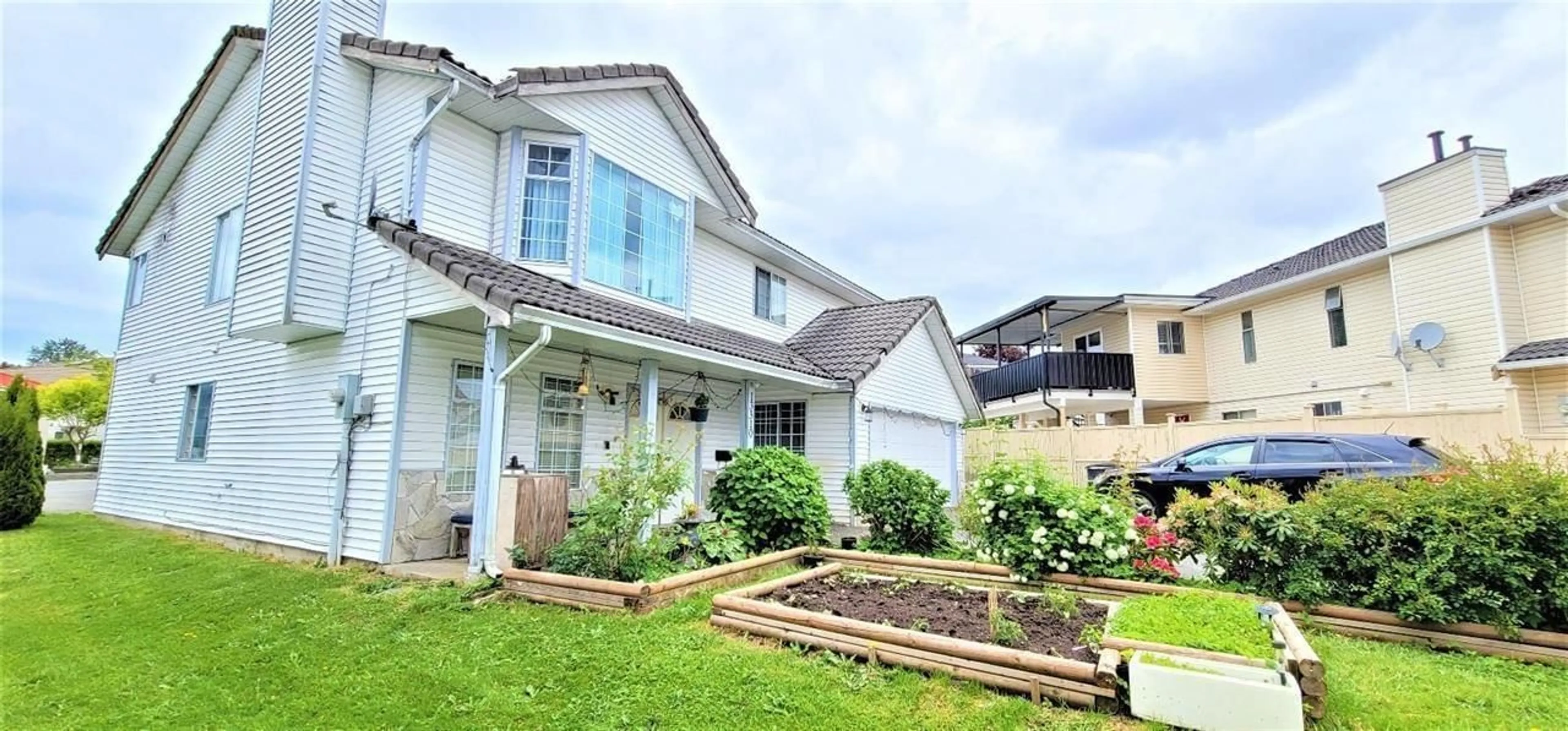 A pic from outside/outdoor area/front of a property/back of a property/a pic from drone, street for 13310 88A AVENUE, Surrey British Columbia V3V7W4