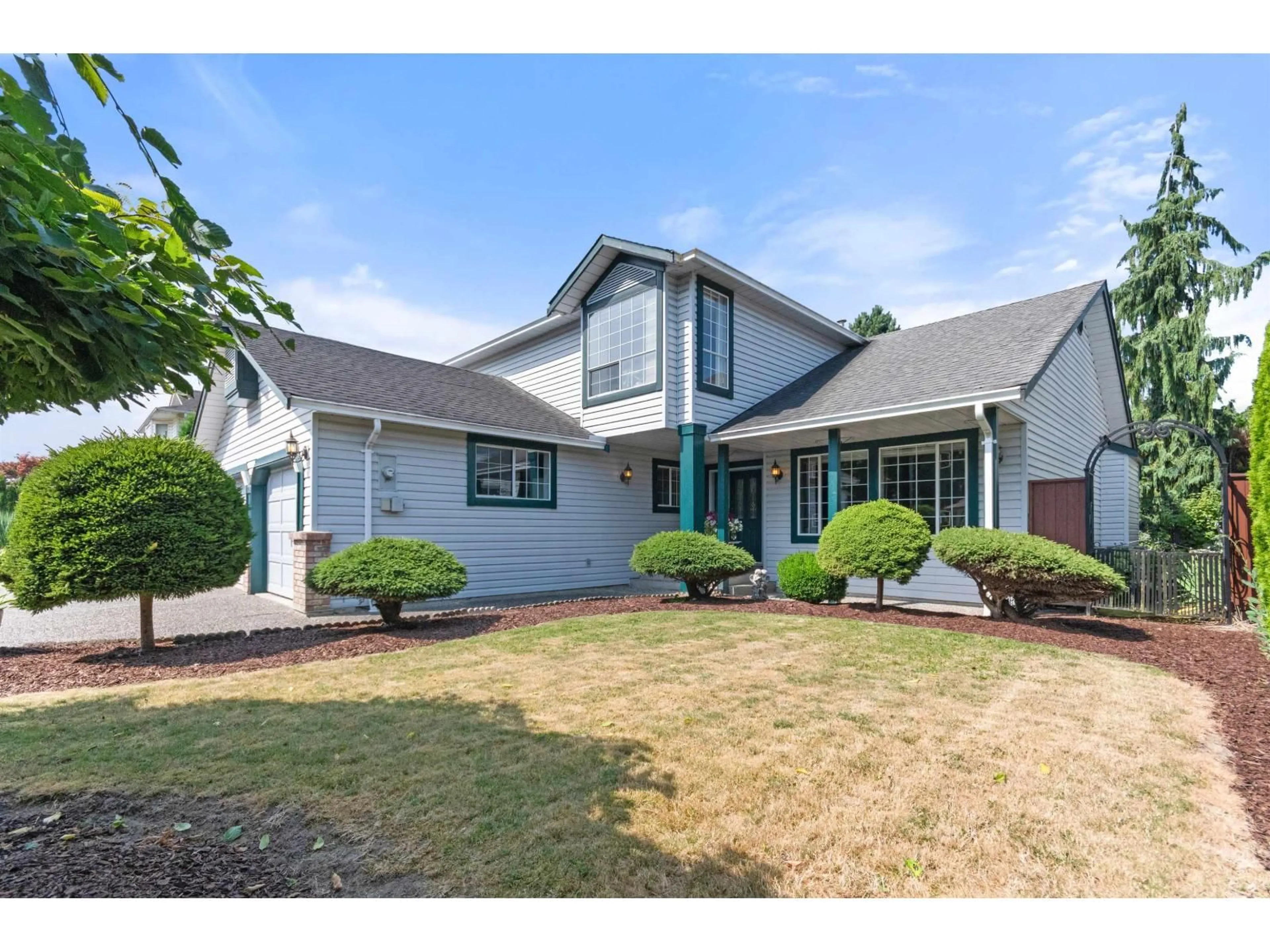 Home with vinyl exterior material, street for 7019 WILTSHIRE STREET, Chilliwack British Columbia V2R2S9
