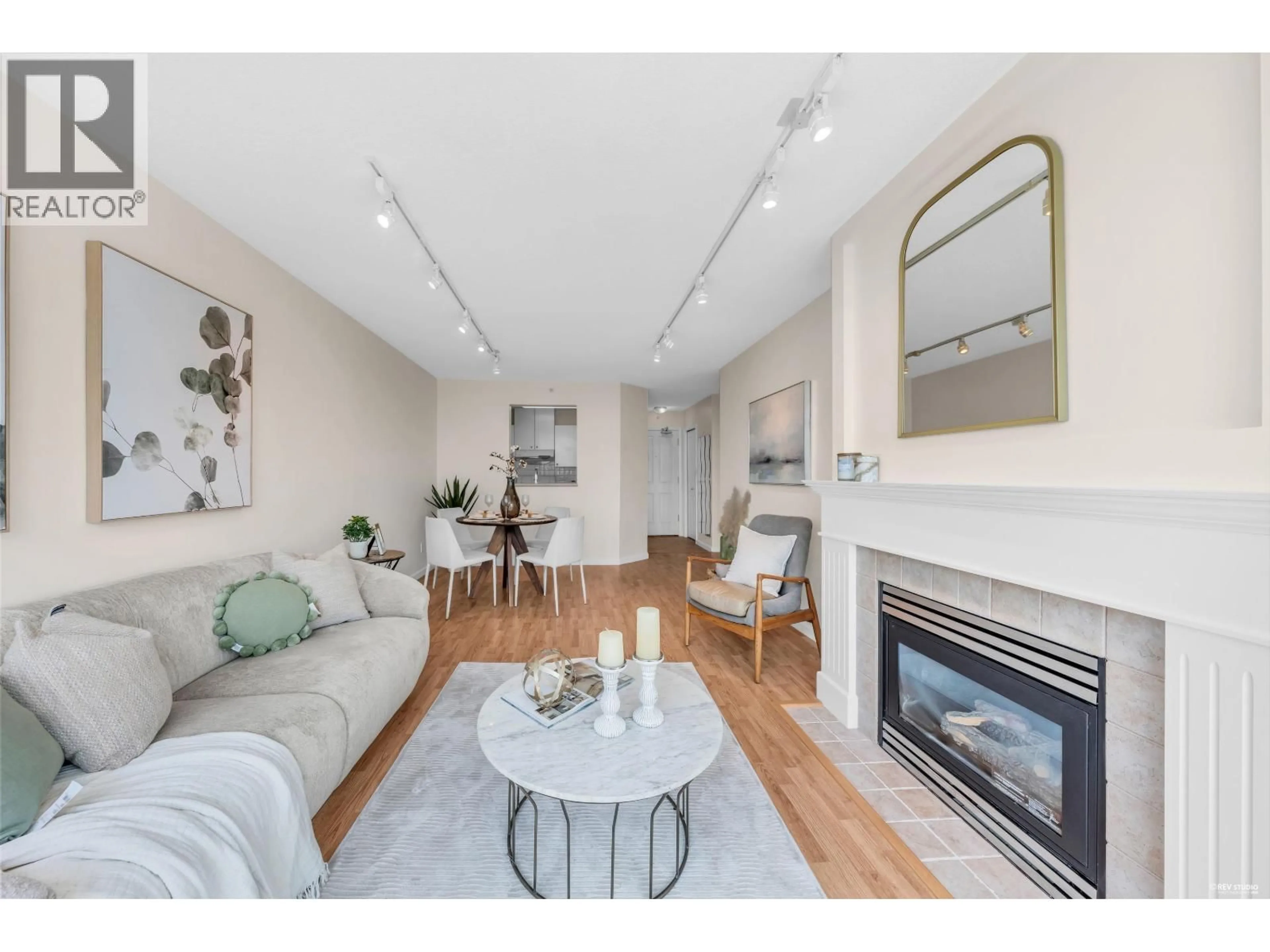 Living room with furniture, wood/laminate floor for 1702 - 6611 SOUTHOAKS CRESCENT, Burnaby British Columbia V5E4L5