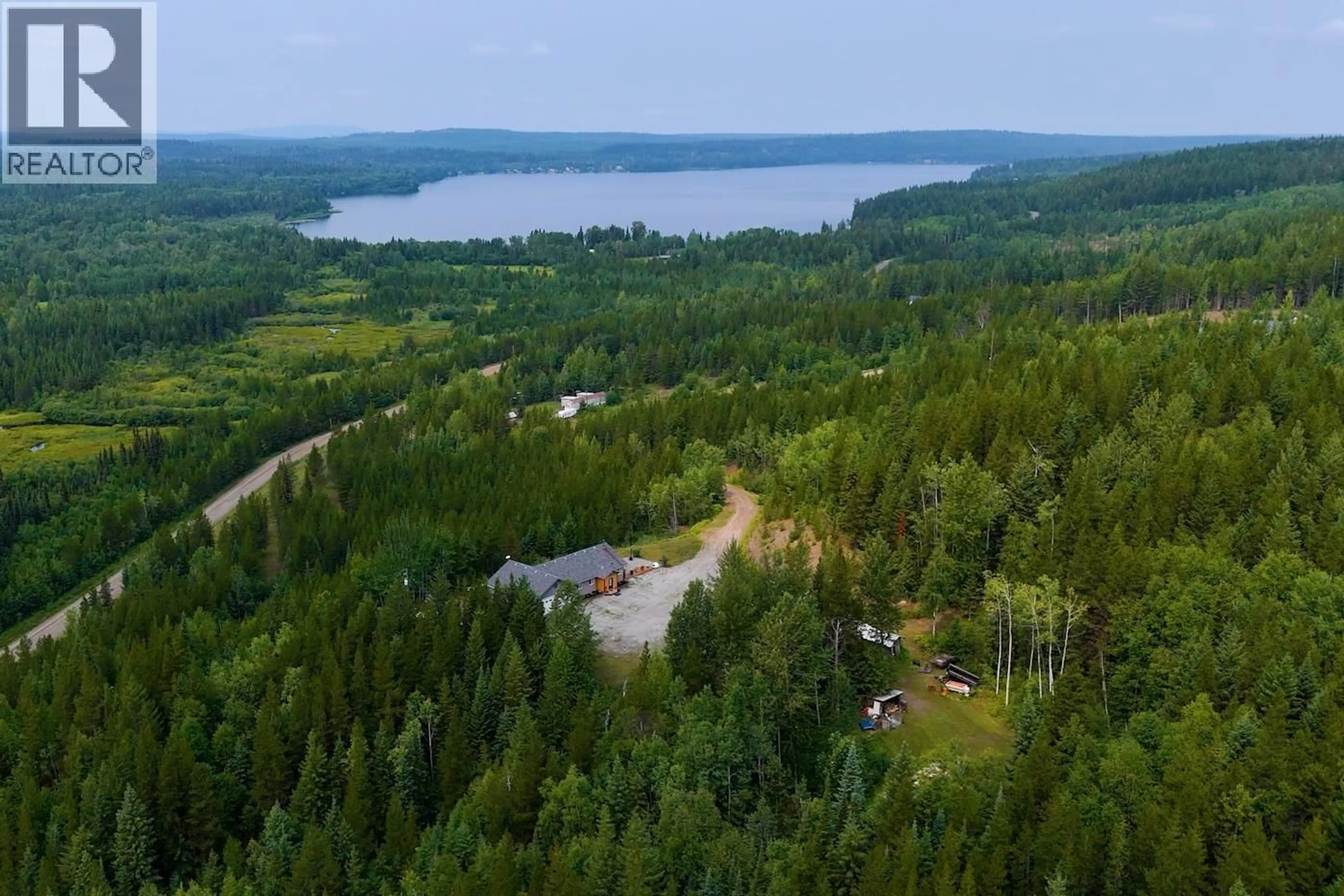 A pic from outside/outdoor area/front of a property/back of a property/a pic from drone, water/lake/river/ocean view for 25800 WEST LAKE ROAD, Prince George British Columbia V2N6H6