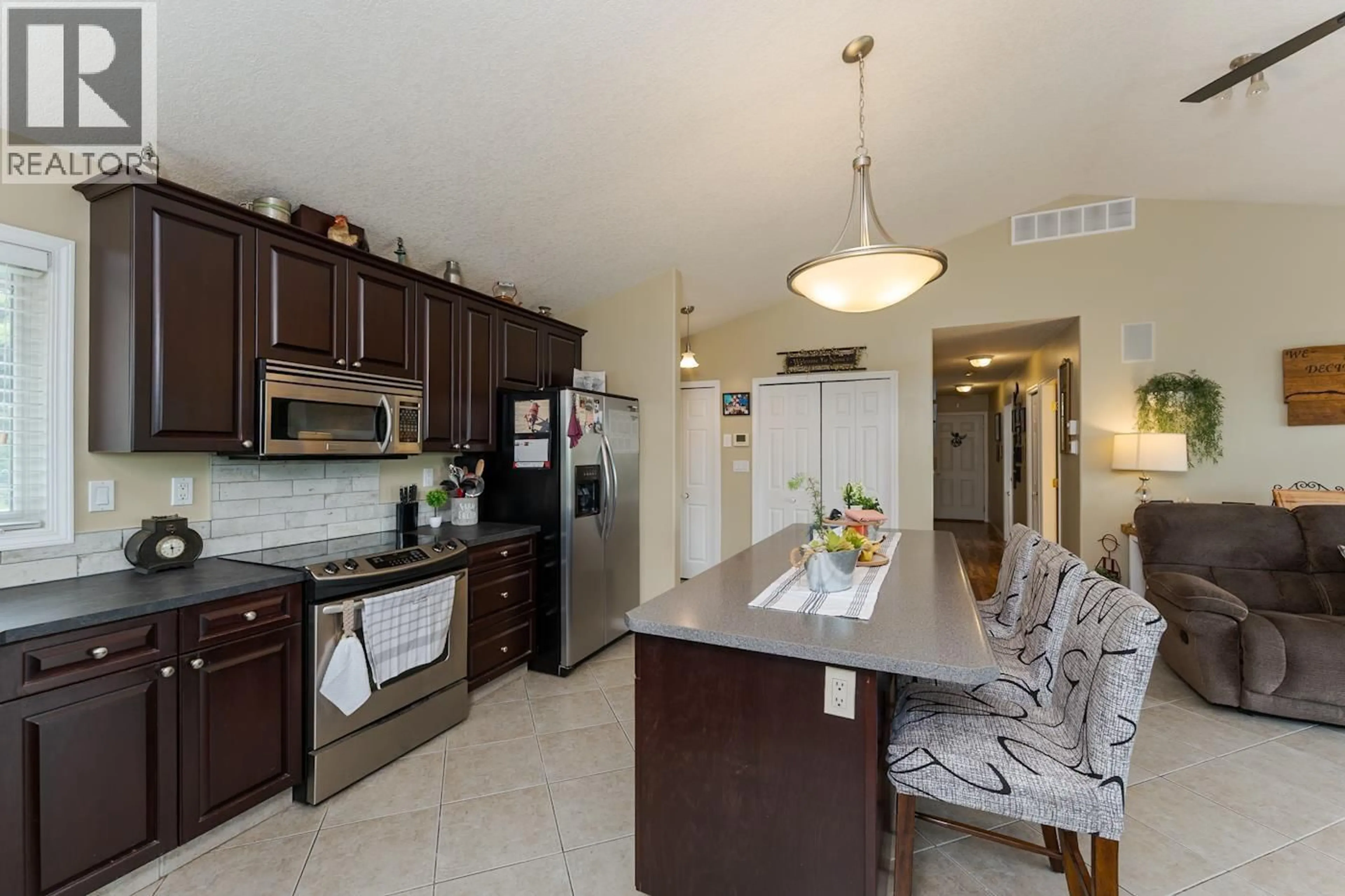 Open concept kitchen, ceramic/tile floor for 25800 WEST LAKE ROAD, Prince George British Columbia V2N6H6