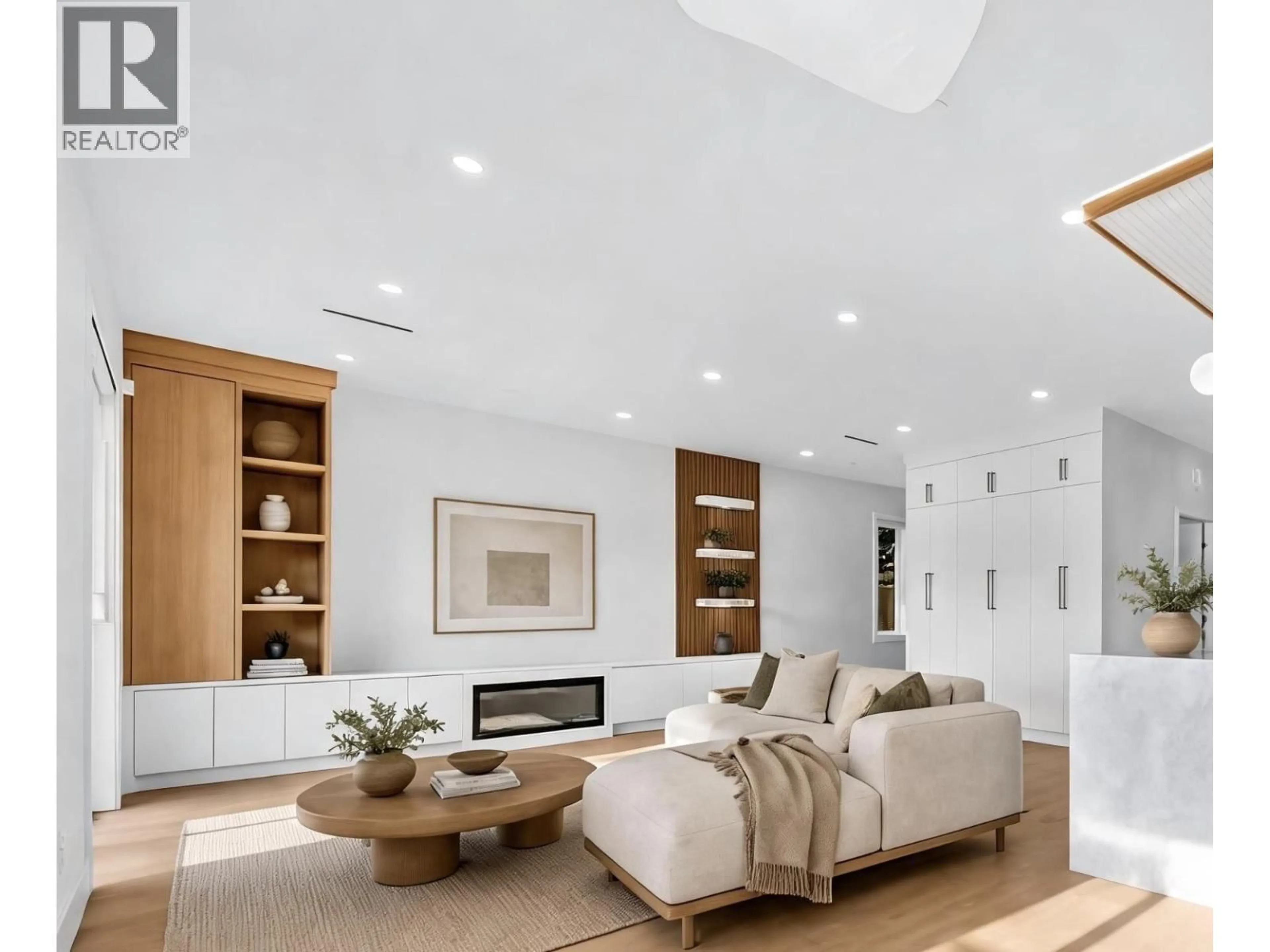 Living room with furniture, wood/laminate floor for 2 - 6388 ARGYLE STREET, Vancouver British Columbia V5P3K3