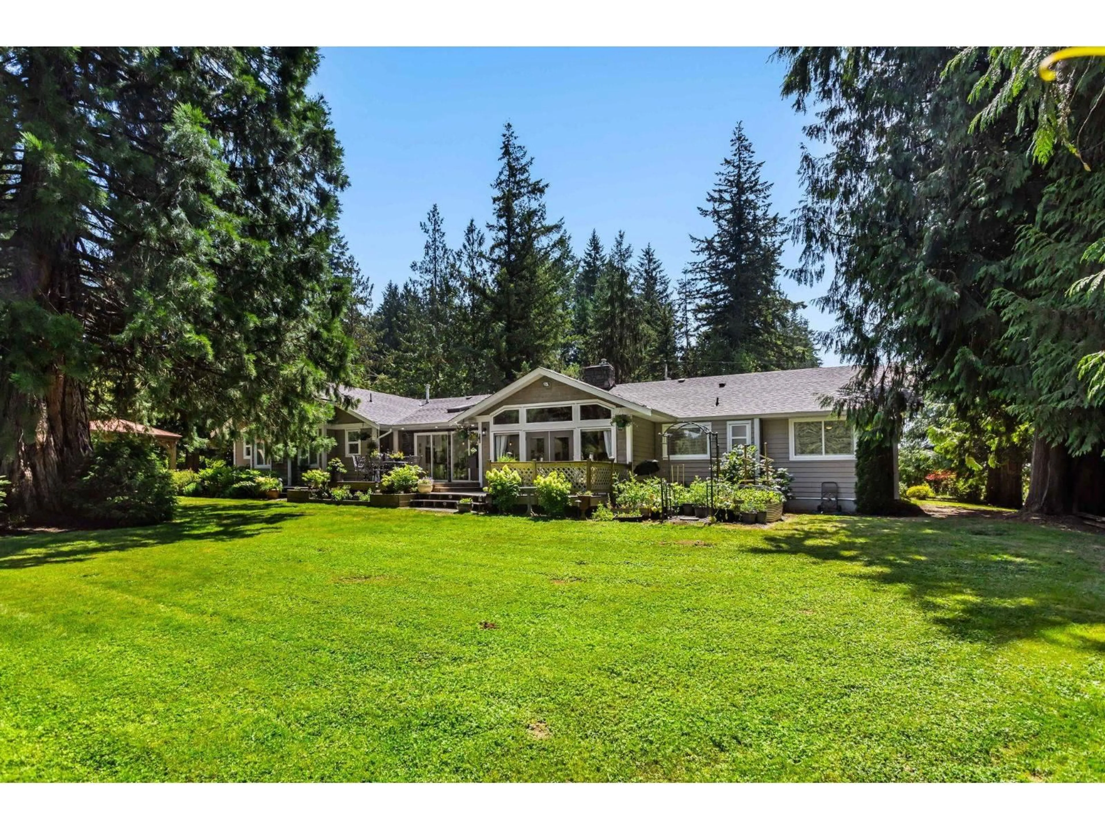 A pic from outside/outdoor area/front of a property/back of a property/a pic from drone, mountain view for 26627 60 AVENUE, Langley British Columbia V4W1V7