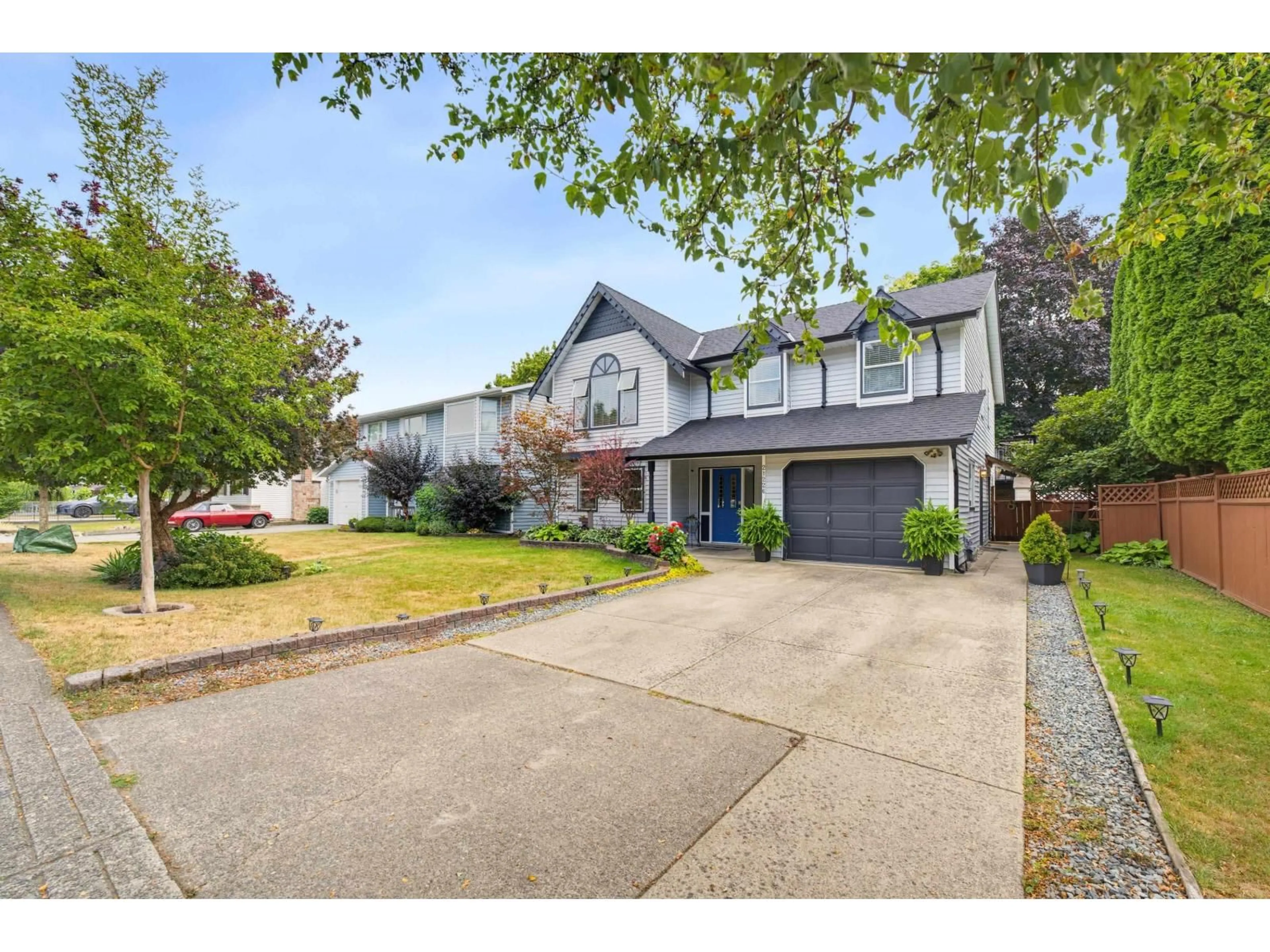 Home with vinyl exterior material, street for 21226 92 AVENUE, Langley British Columbia V1M1L2
