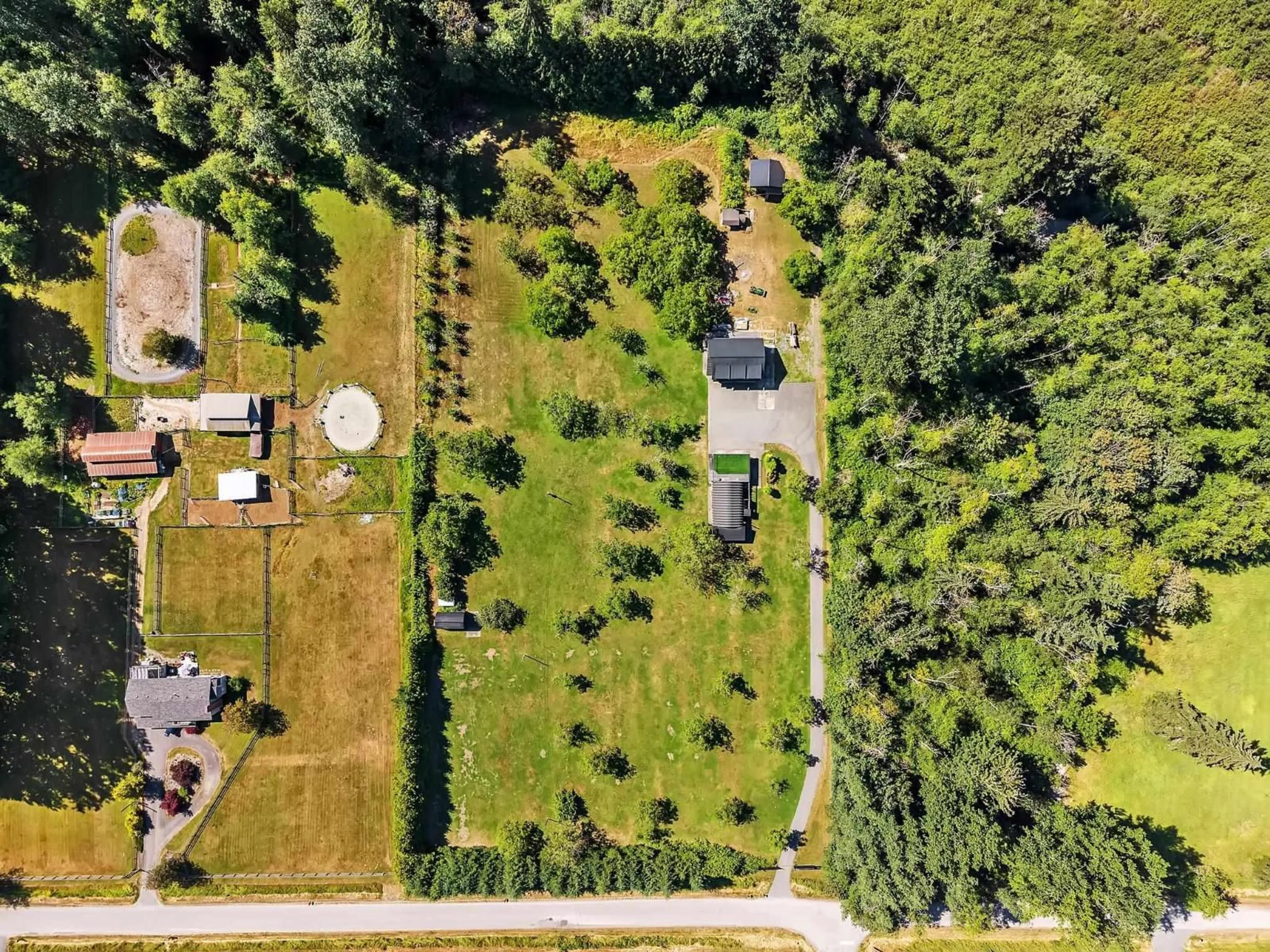 A pic from outside/outdoor area/front of a property/back of a property/a pic from drone, forest/trees view for 21228 8 AVENUE, Langley British Columbia V2Z1S9