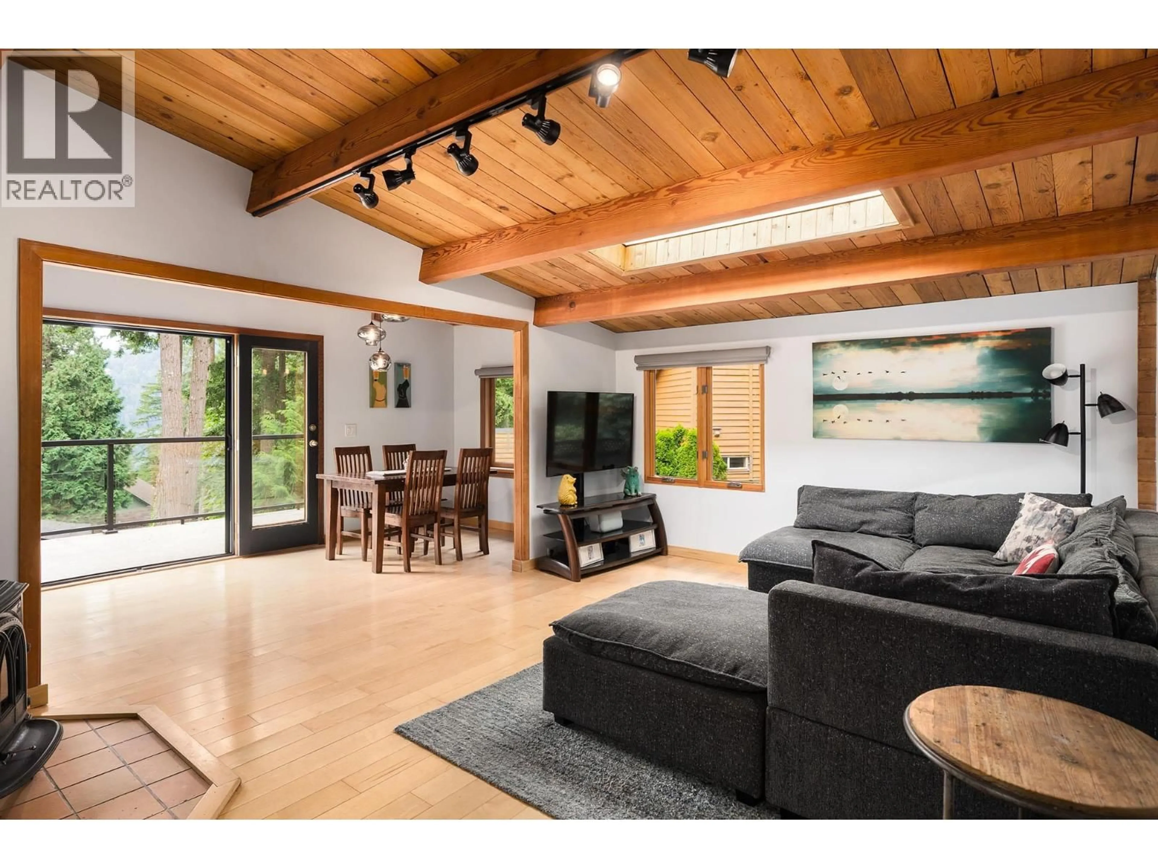 Living room with furniture, wood/laminate floor for 1222 MILLER ROAD, Bowen Island British Columbia V0N1G1