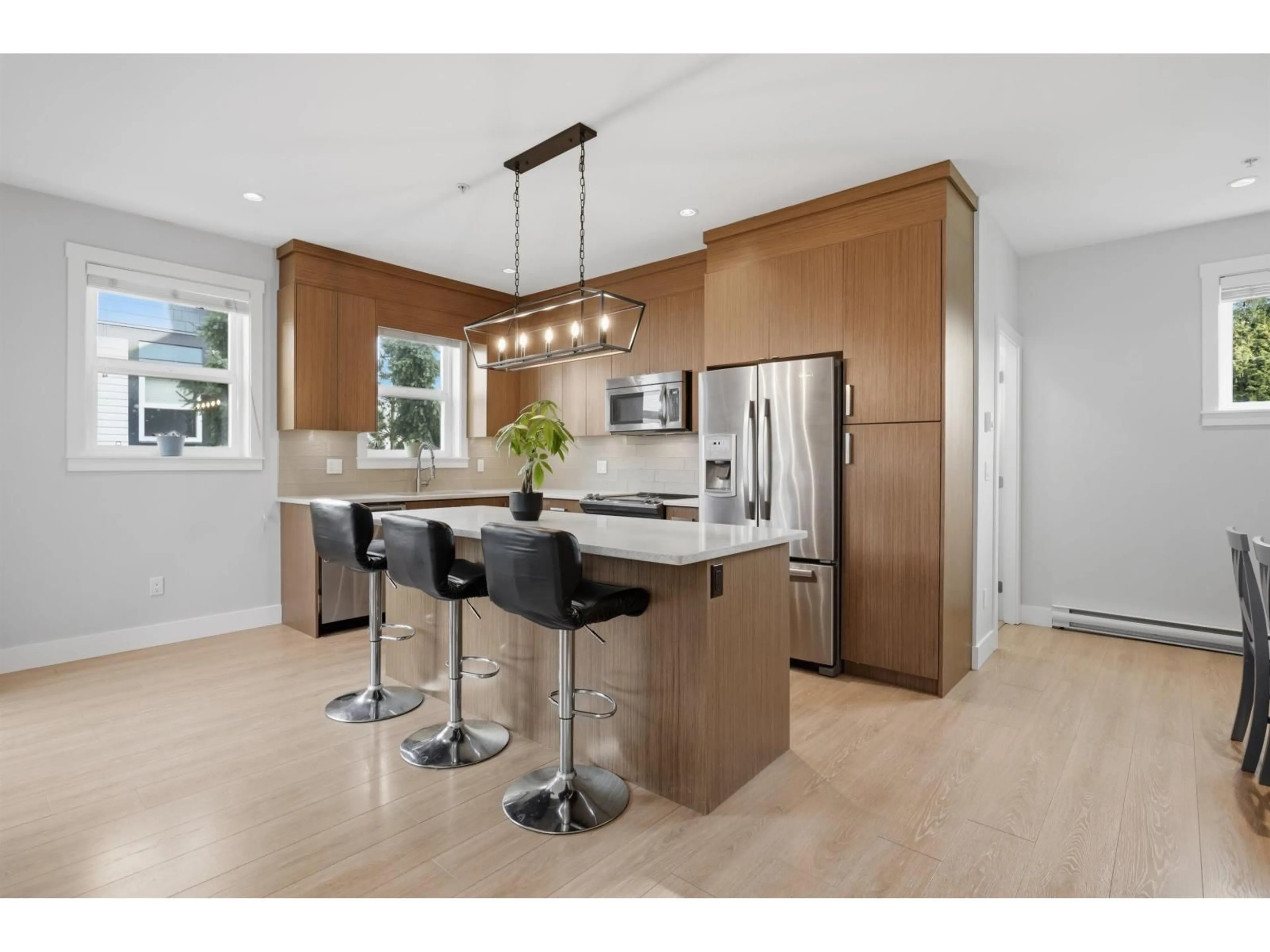 Open concept kitchen, wood/laminate floor for 30 - 20856 76 AVENUE, Langley British Columbia V2Y0S7