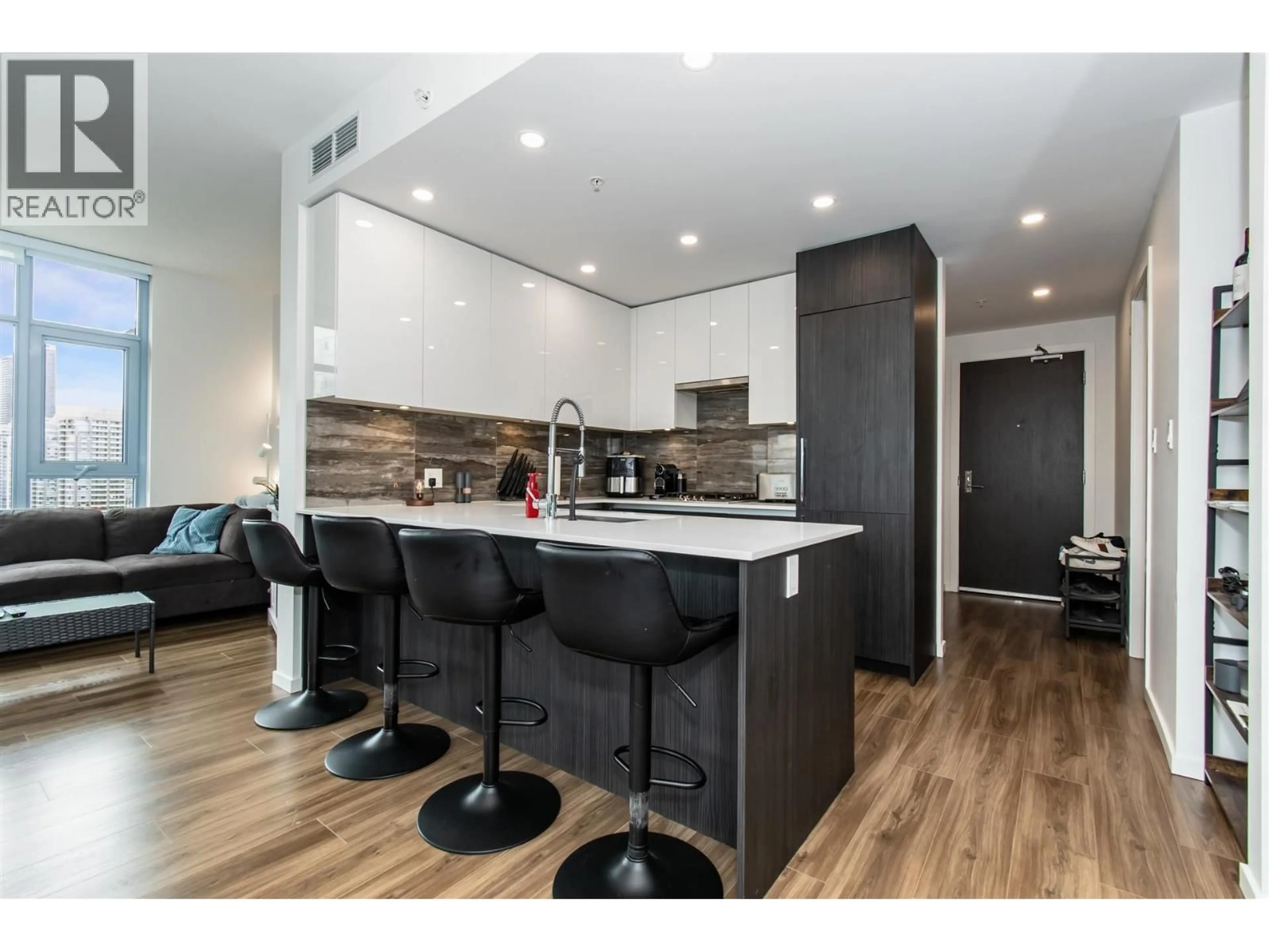 Open concept kitchen, wood/laminate floor for 1801 - 1888 GILMORE AVENUE, Burnaby British Columbia V5C0L2