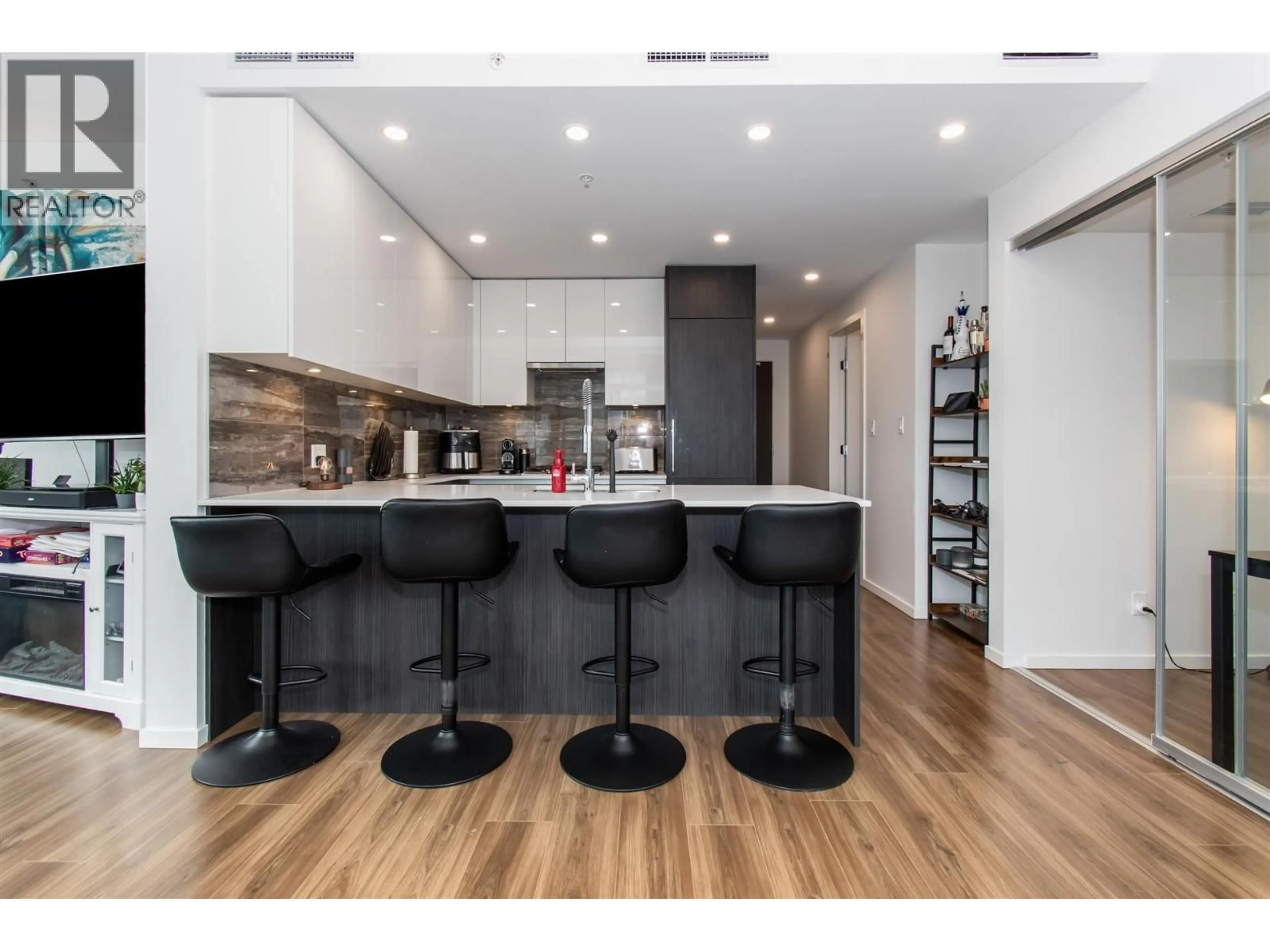 Open concept kitchen, wood/laminate floor for 1801 - 1888 GILMORE AVENUE, Burnaby British Columbia V5C0L2