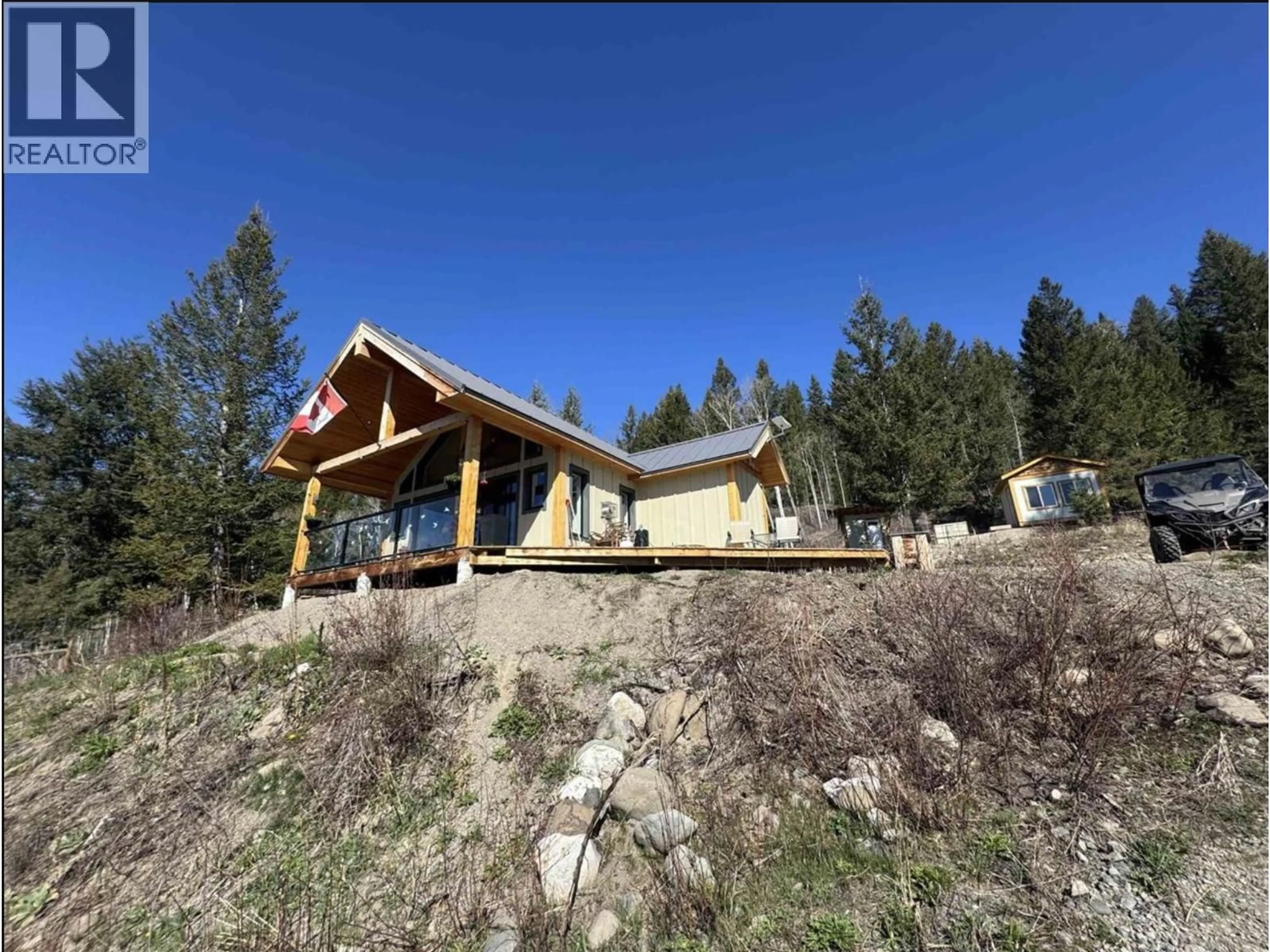 A pic from outside/outdoor area/front of a property/back of a property/a pic from drone, mountain view for 6656 NORTH SHORE HORSE LAKE ROAD, Horse Lake British Columbia V0K1X3