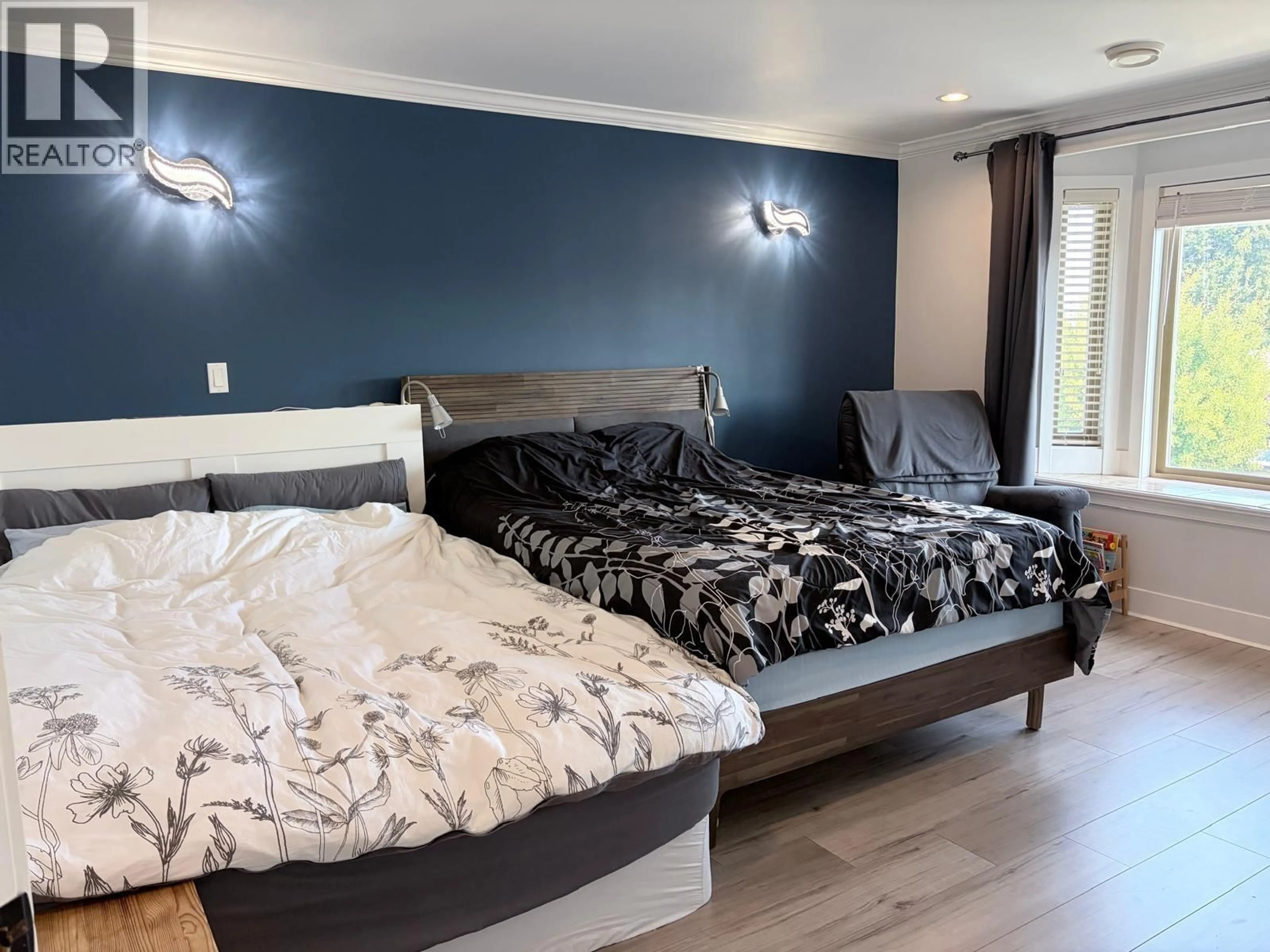 Bedroom with bed, wood/laminate floor for 8068 11TH AVENUE, Burnaby British Columbia V3N2N7