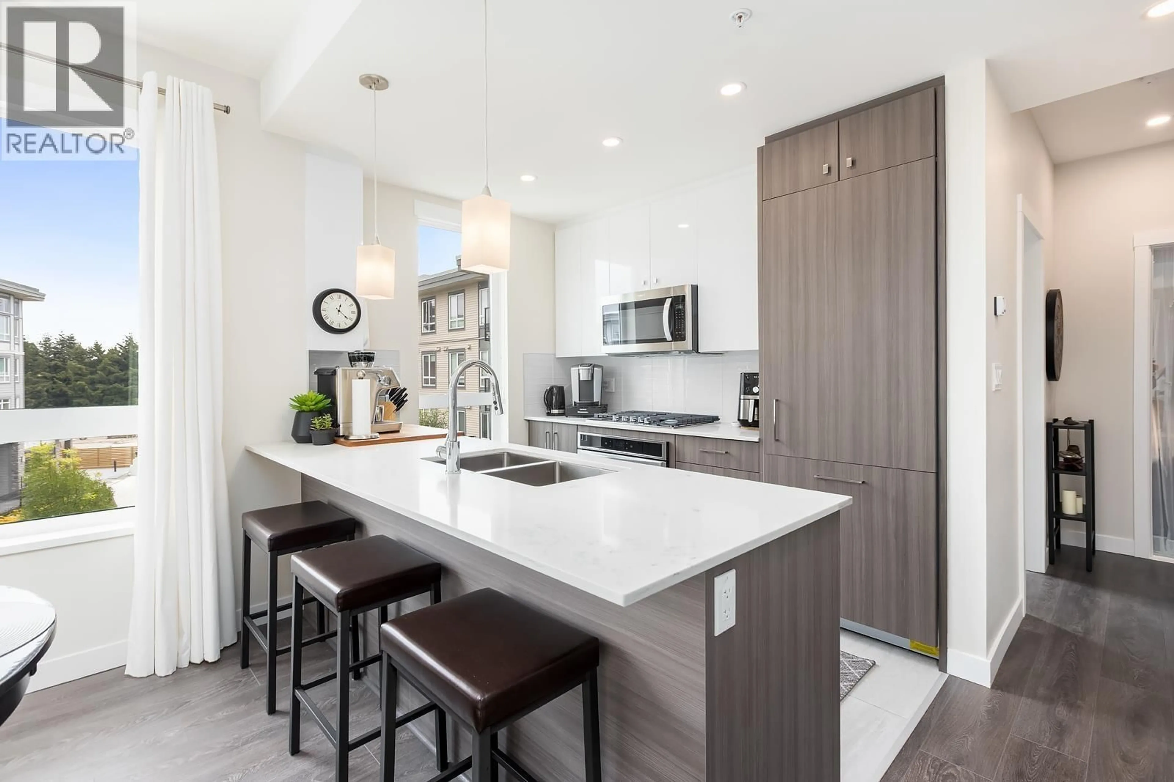 Open concept kitchen, ceramic/tile floor for 315 - 23233 GILLEY ROAD, Richmond British Columbia V6V1E6