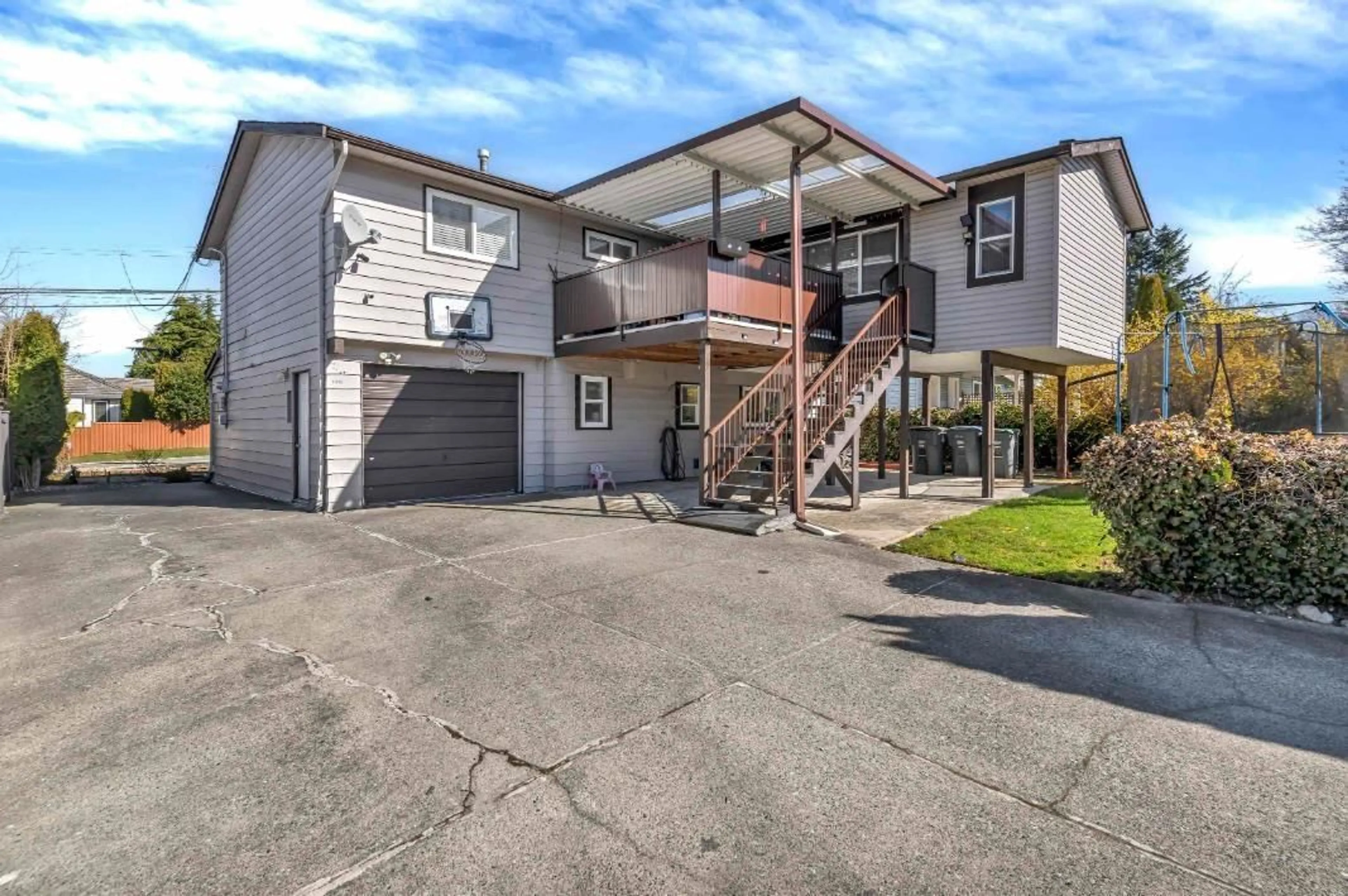 A pic from outside/outdoor area/front of a property/back of a property/a pic from drone, street for 18240 64 AVENUE, Surrey British Columbia V3S8A7