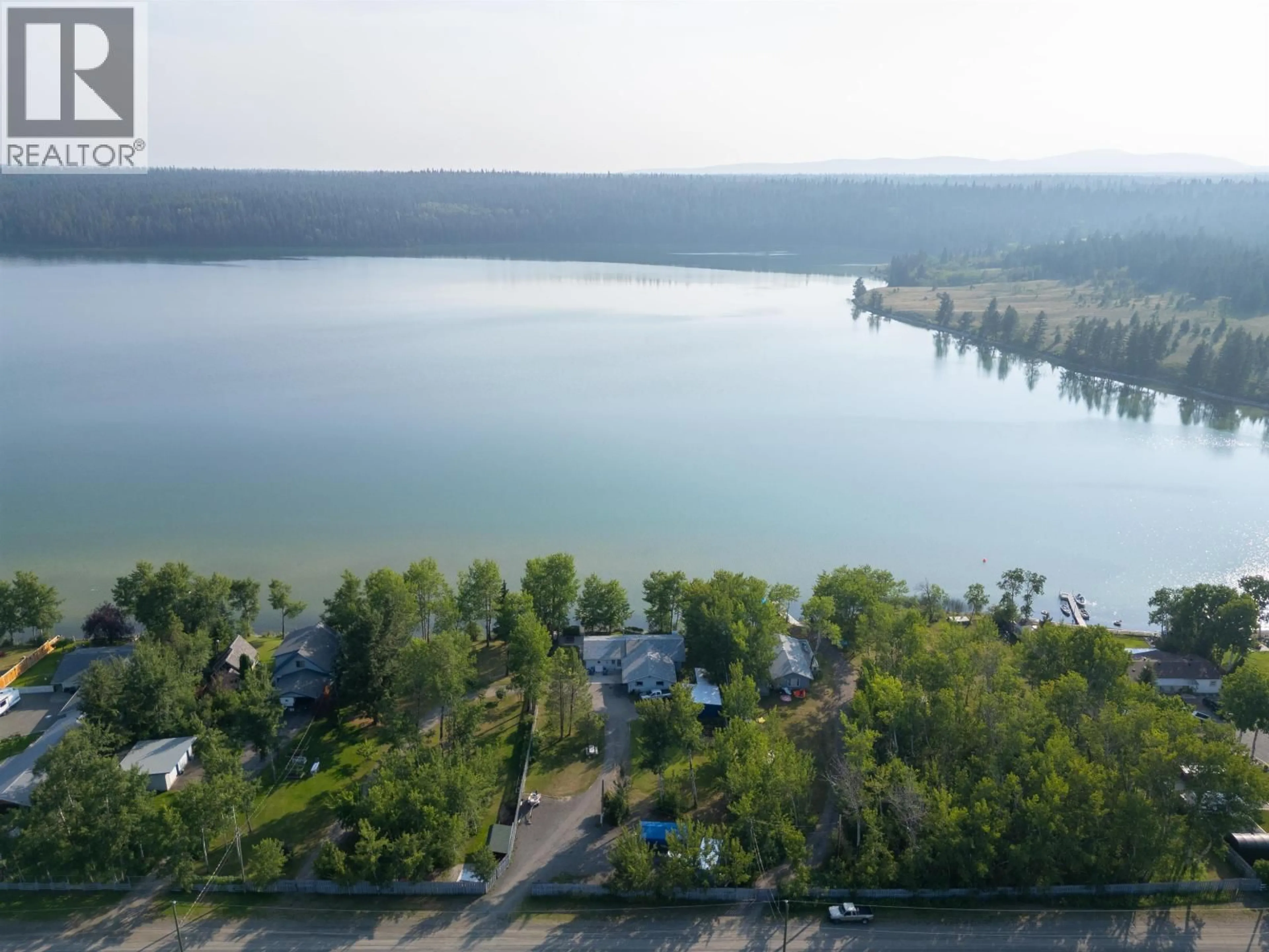 A pic from outside/outdoor area/front of a property/back of a property/a pic from drone, water/lake/river/ocean view for 2464 FELKER LAKE DRIVE, Williams Lake British Columbia V2G5J3
