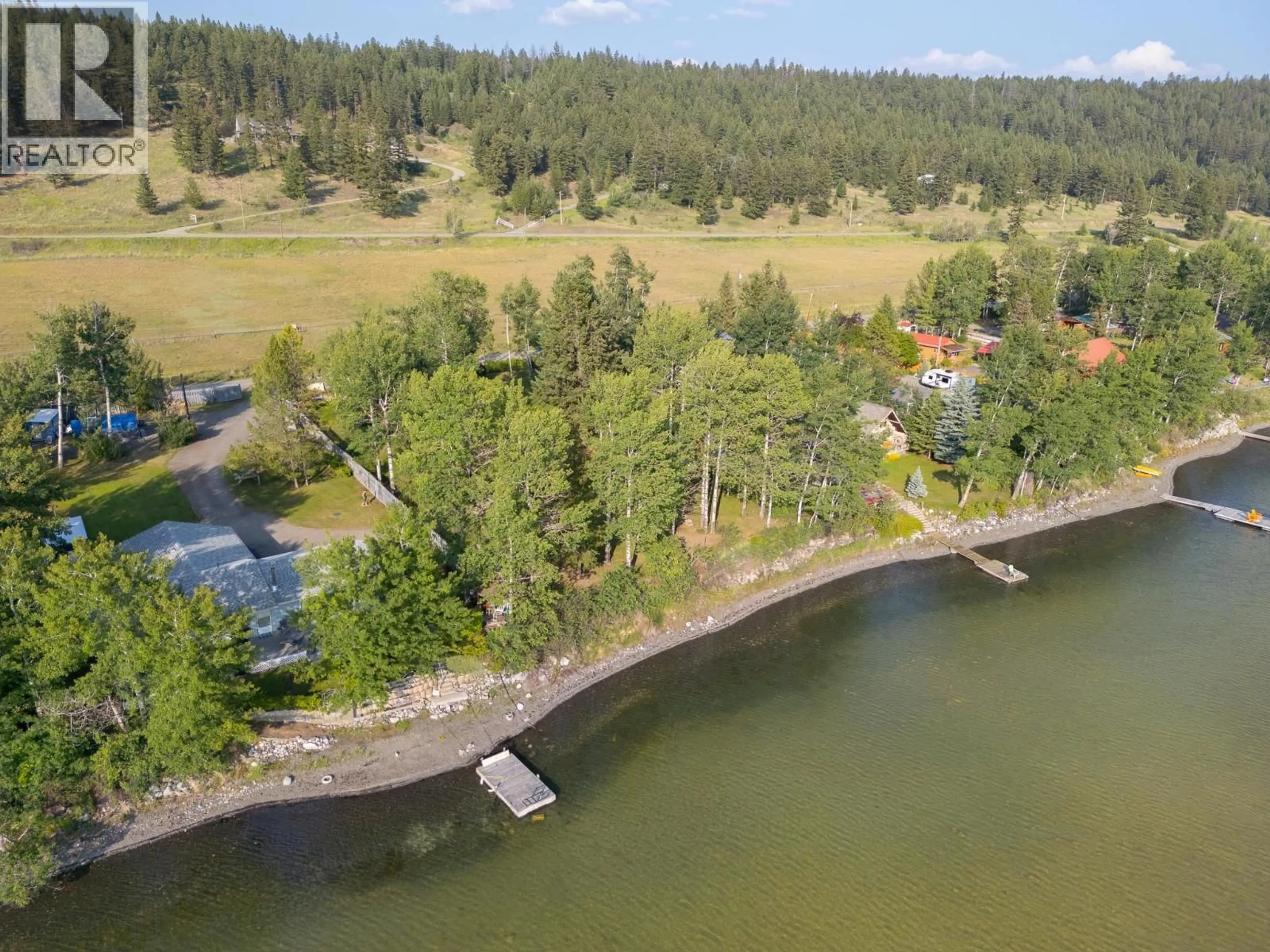 A pic from outside/outdoor area/front of a property/back of a property/a pic from drone, water/lake/river/ocean view for 2464 FELKER LAKE DRIVE, Williams Lake British Columbia V2G5J3