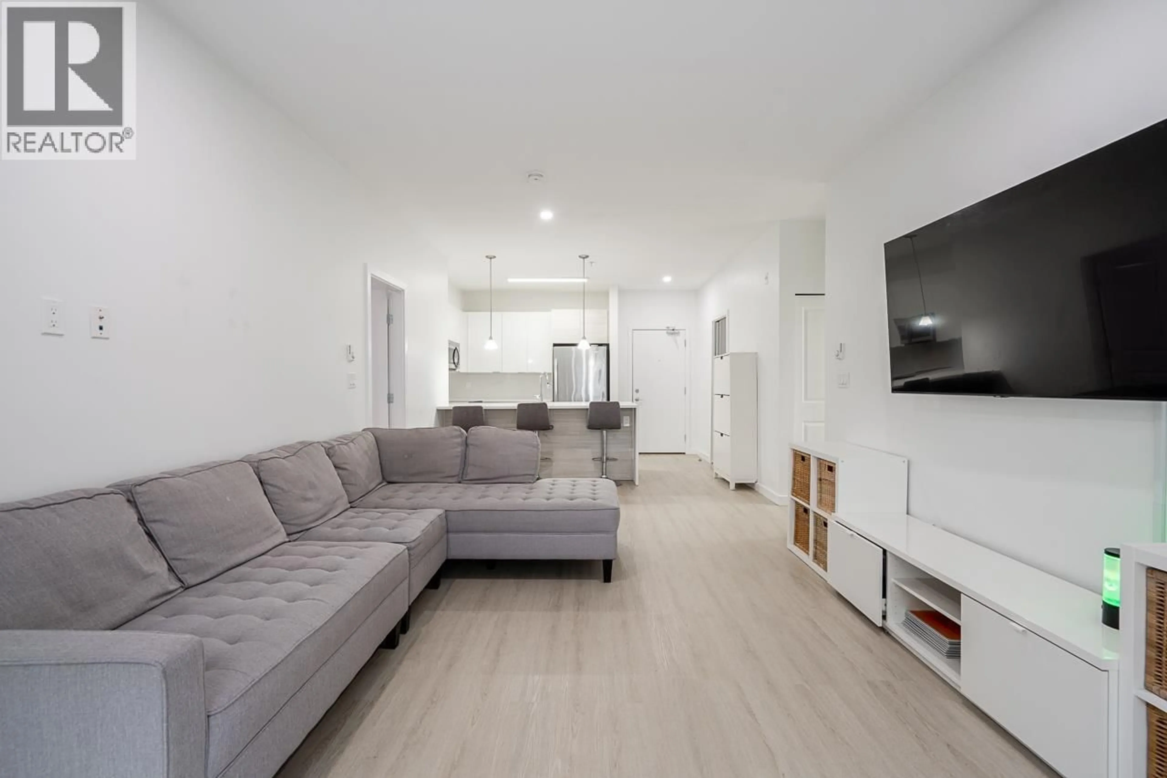 Living room with furniture, unknown for 110 - 225 FRANCIS WAY, New Westminster British Columbia V3L0G1