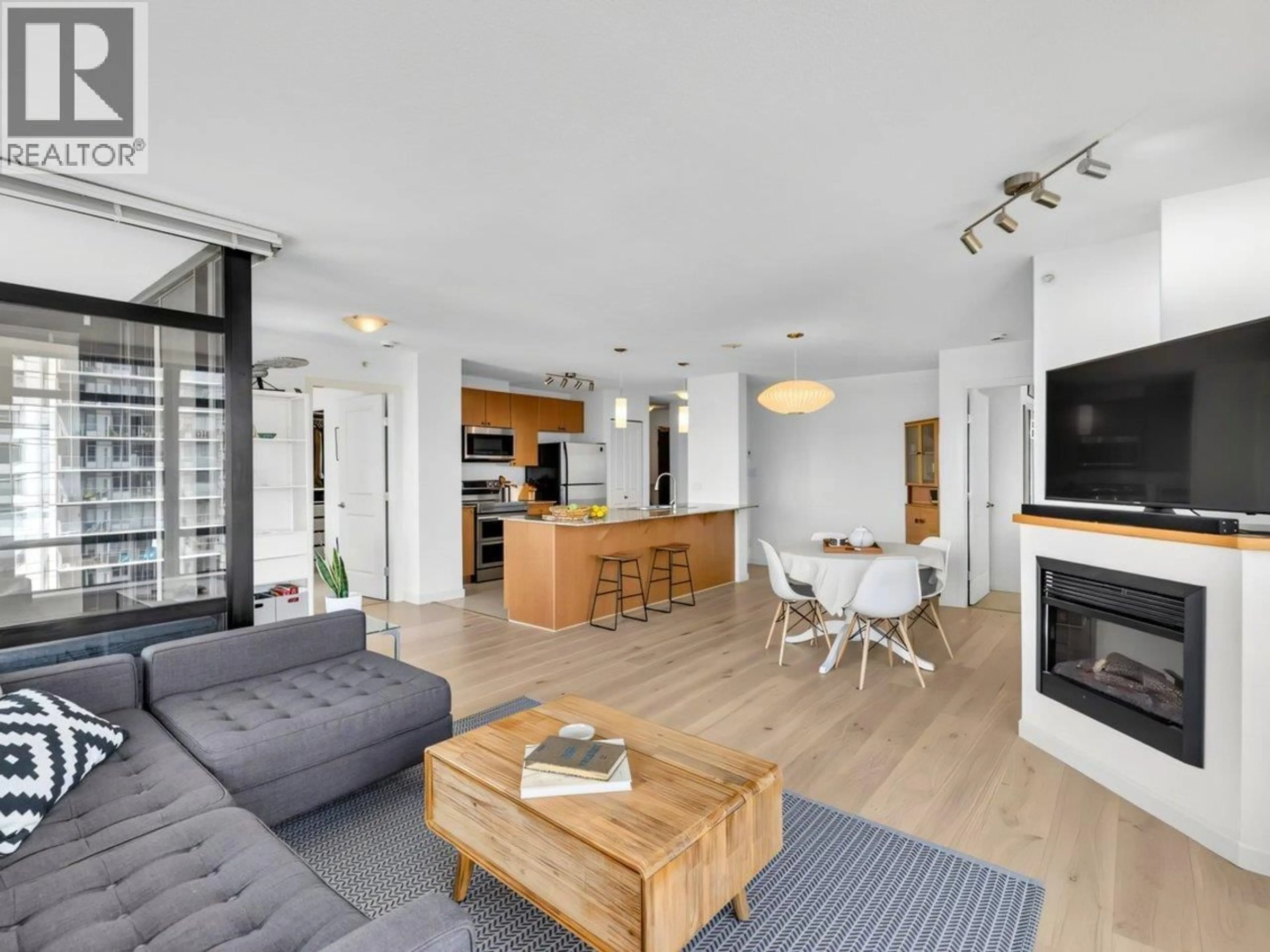 Living room with furniture, wood/laminate floor for 1205 - 610 VICTORIA STREET, New Westminster British Columbia V3M0A5